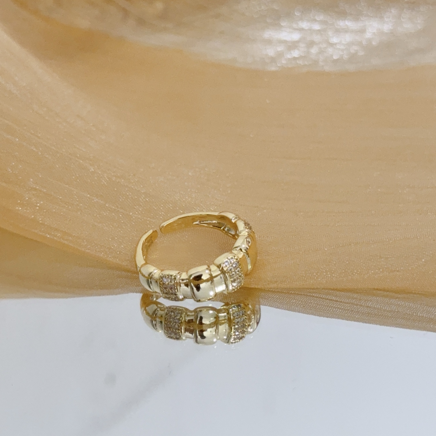 Piaget Possession ring yellow gold with clear diamond accents adjustable open band