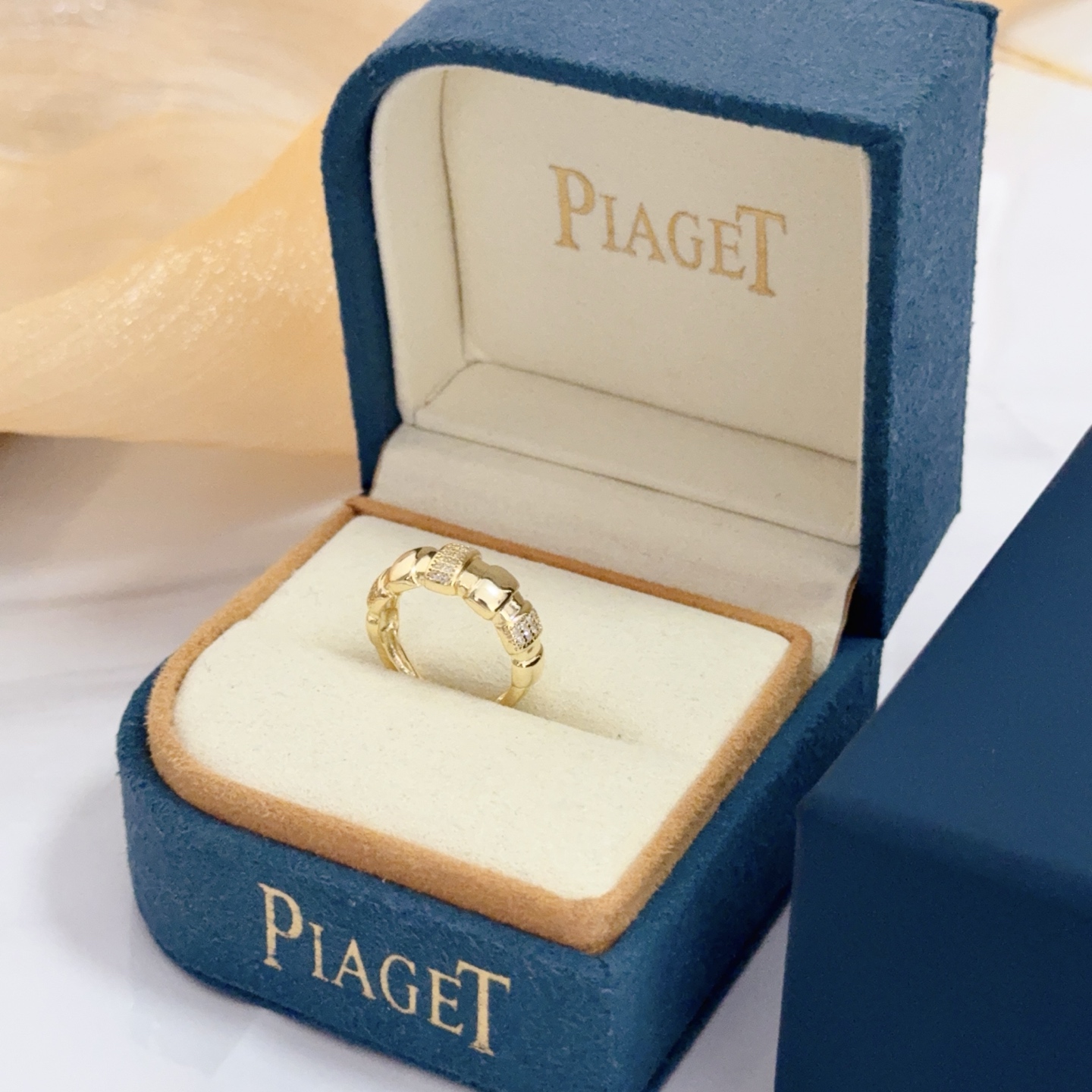 Piaget Possession ring yellow gold with clear diamond accents adjustable open band