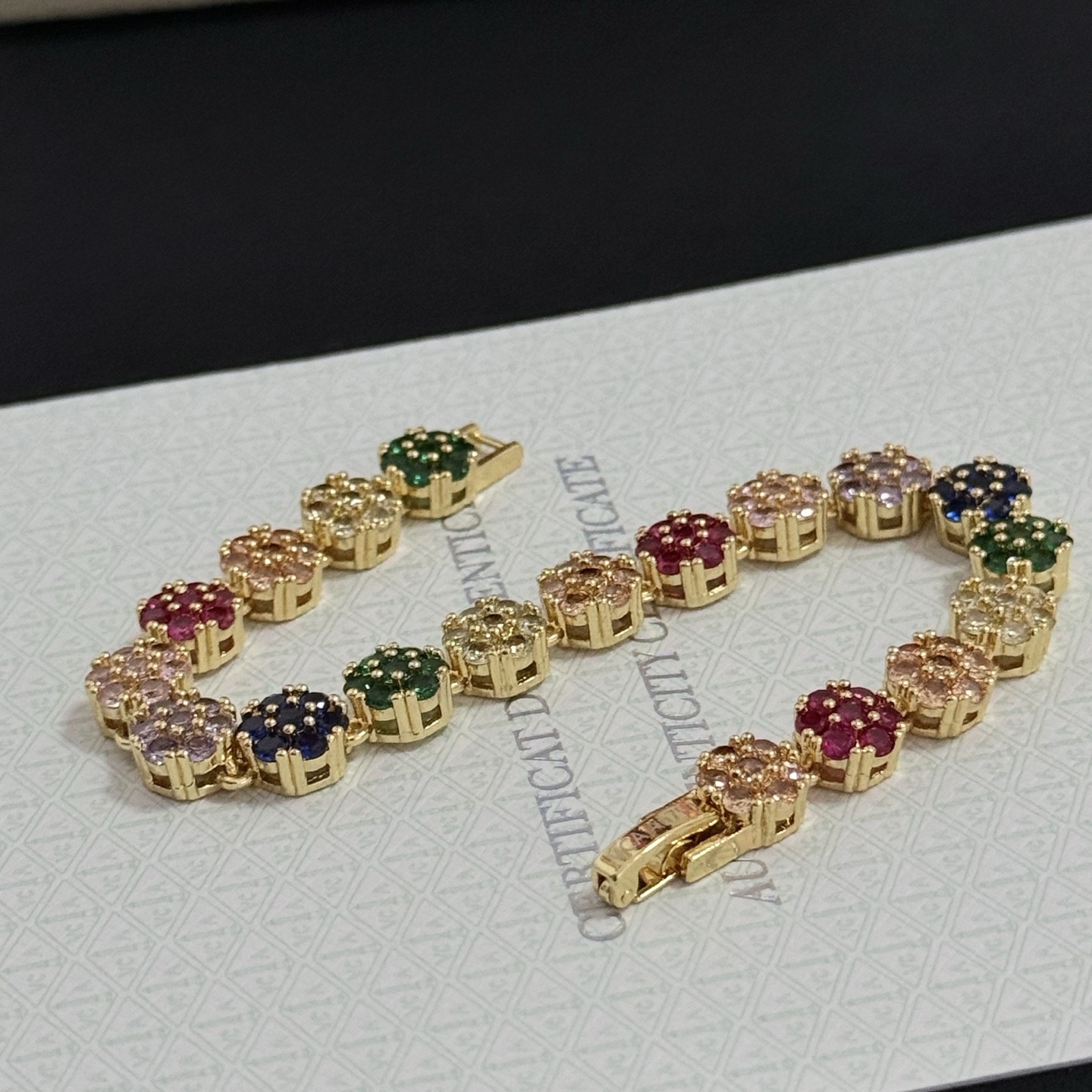 Van Cleef Arpels Fleurette Multi Gemstone Bracelet bracelet Yellow gold with multicolor gemstones fuchsia pink emerald green sapphire blue lavender purple champagne clear white 18cm