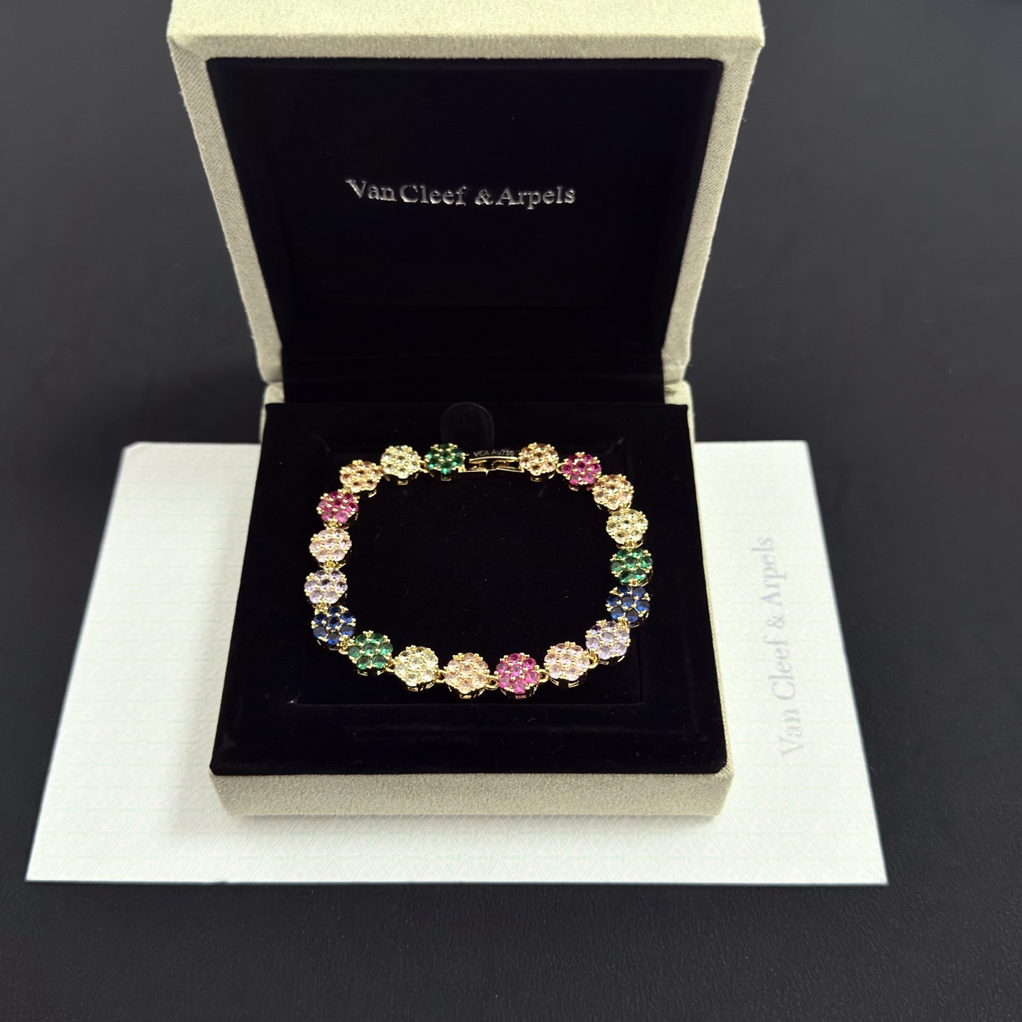 Van Cleef Arpels Fleurette Multi Gemstone Bracelet bracelet Yellow gold with multicolor gemstones fuchsia pink emerald green sapphire blue lavender purple champagne clear white 18cm