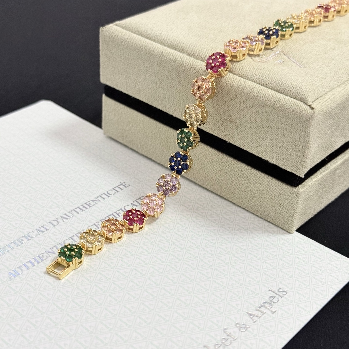 Van Cleef Arpels Fleurette Multi Gemstone Bracelet bracelet Yellow gold with multicolor gemstones fuchsia pink emerald green sapphire blue lavender purple champagne clear white 18cm