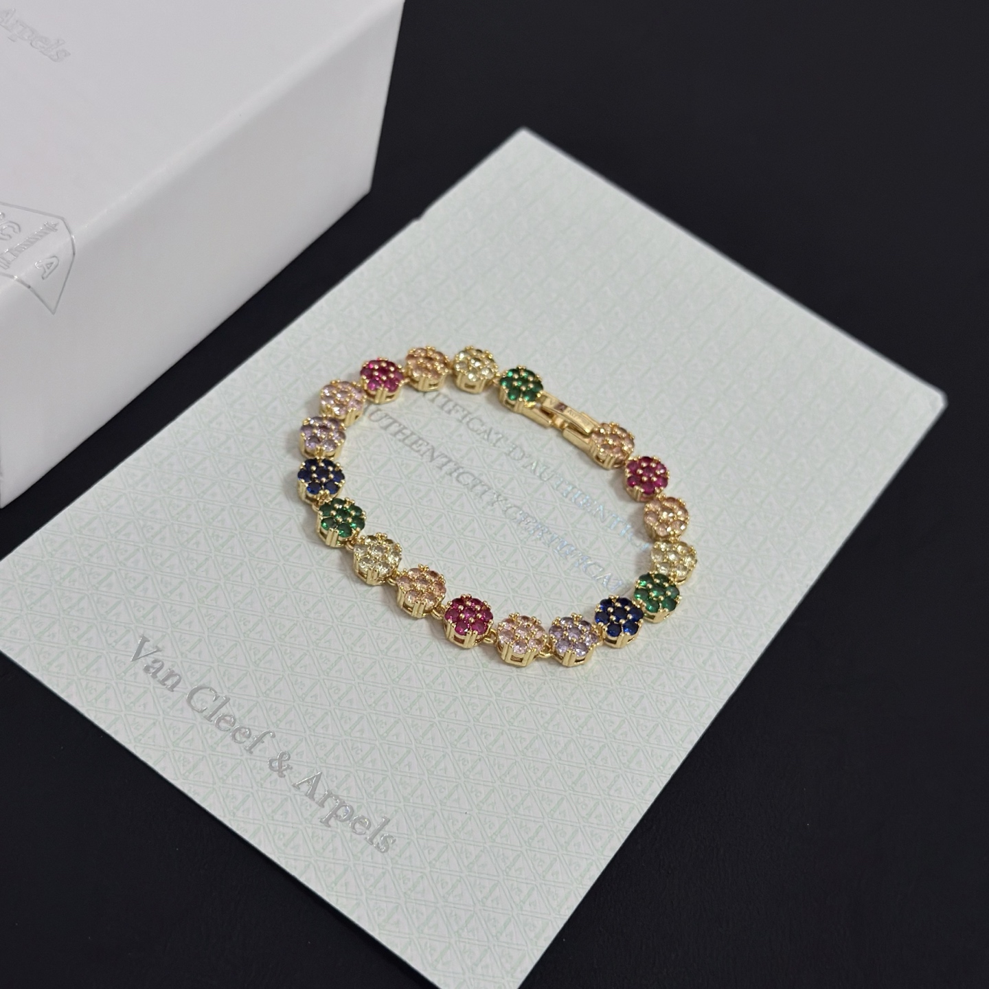 Van Cleef Arpels Fleurette Multi Gemstone Bracelet bracelet Yellow gold with multicolor gemstones fuchsia pink emerald green sapphire blue lavender purple champagne clear white 18cm