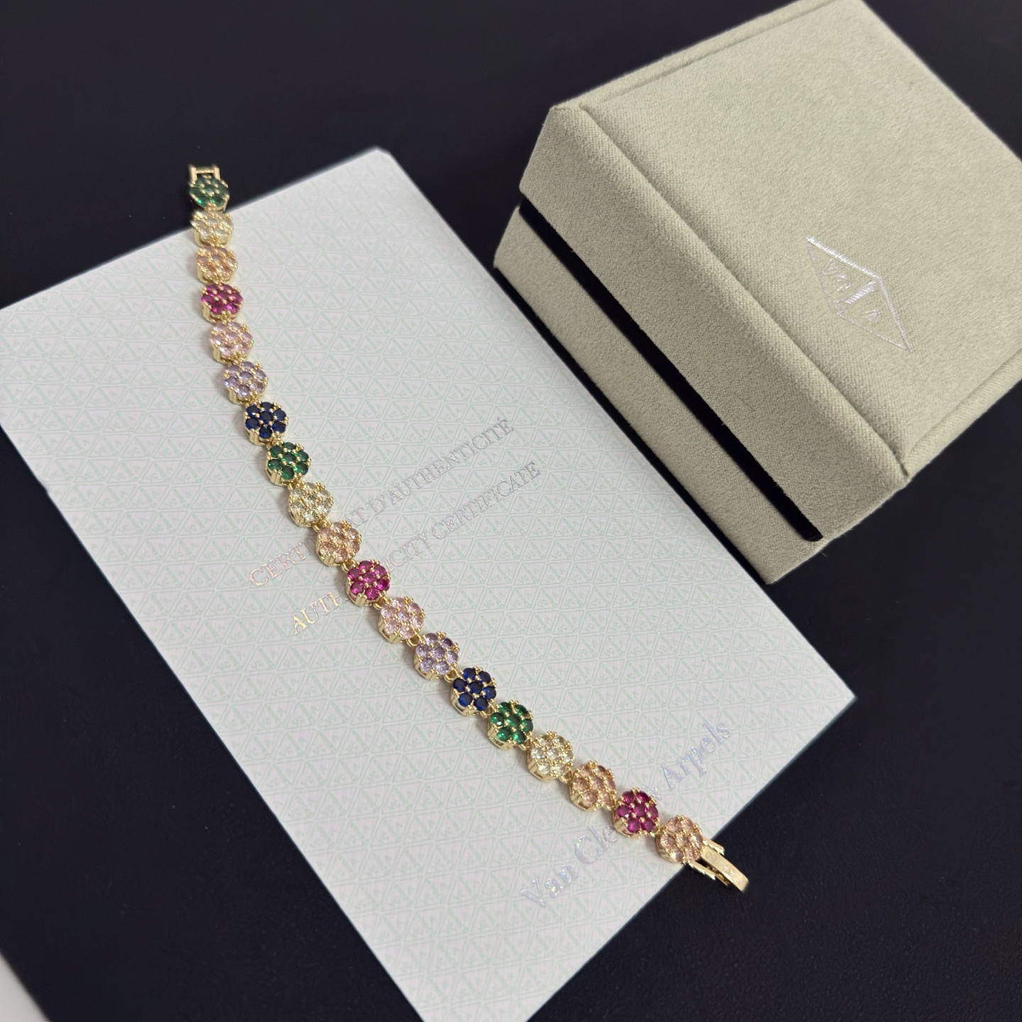 Van Cleef Arpels Fleurette Multi Gemstone Bracelet bracelet Yellow gold with multicolor gemstones fuchsia pink emerald green sapphire blue lavender purple champagne clear white 18cm