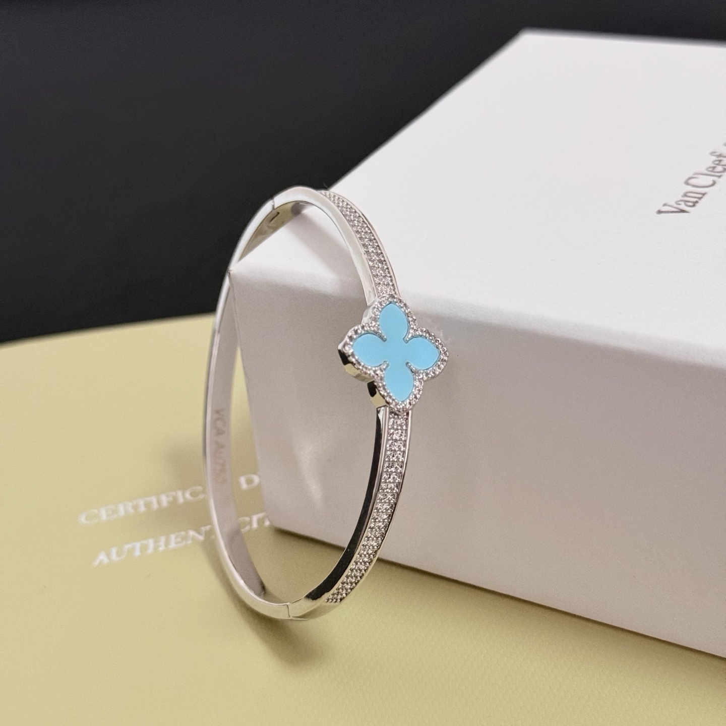 Van Cleef Arpels Alhambra bracelet Silver-toned white gold metal turquoise blue four-leaf clover inlay clear diamond accents 17cm