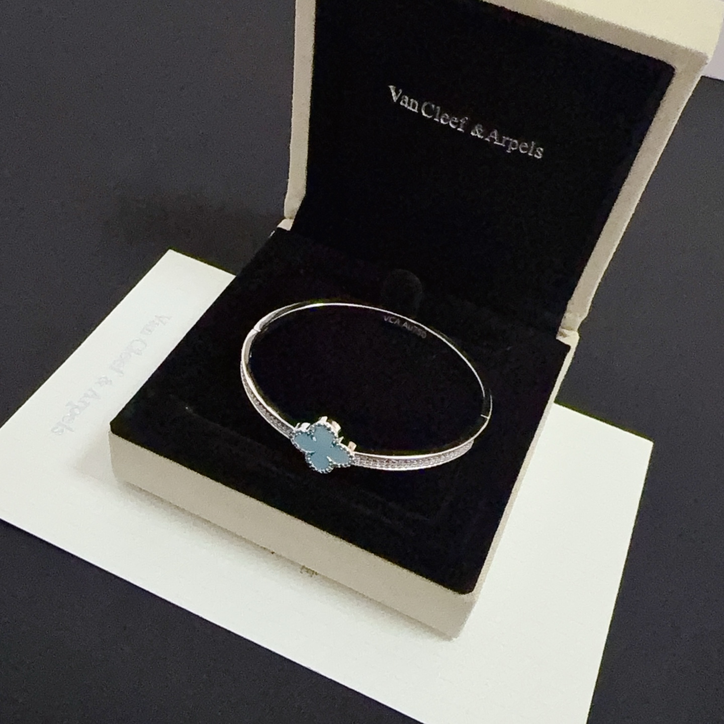 Van Cleef Arpels Alhambra bracelet Silver-toned white gold metal turquoise blue four-leaf clover inlay clear diamond accents 17cm