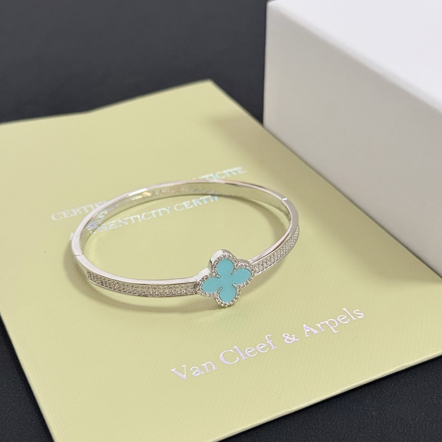 Van Cleef Arpels Alhambra bracelet Silver-toned white gold metal turquoise blue four-leaf clover inlay clear diamond accents 17cm