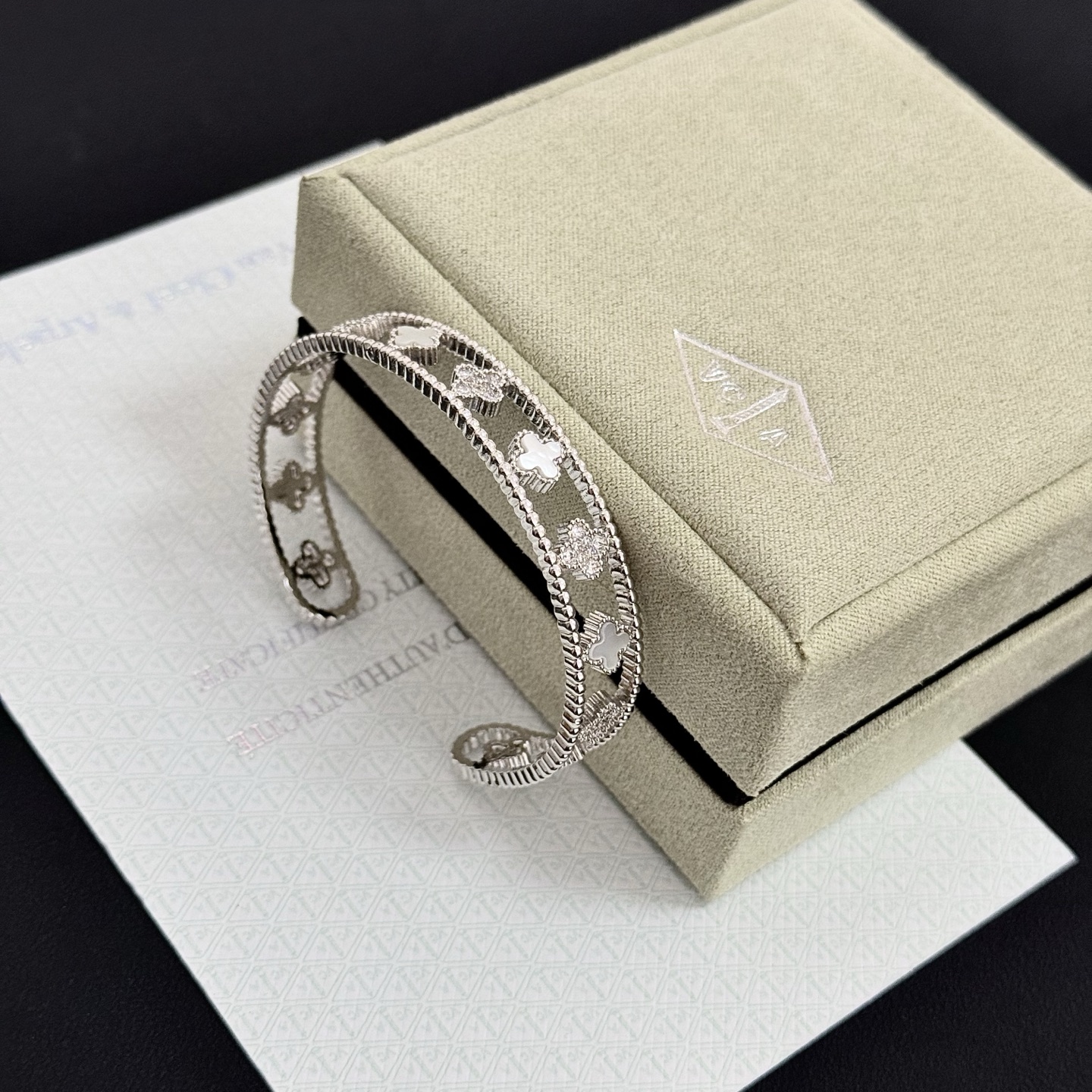 Van Cleef Arpels Perlee Clovers bracelet Silver-toned white gold with white mother-of-pearl and clear diamond accents 17cm