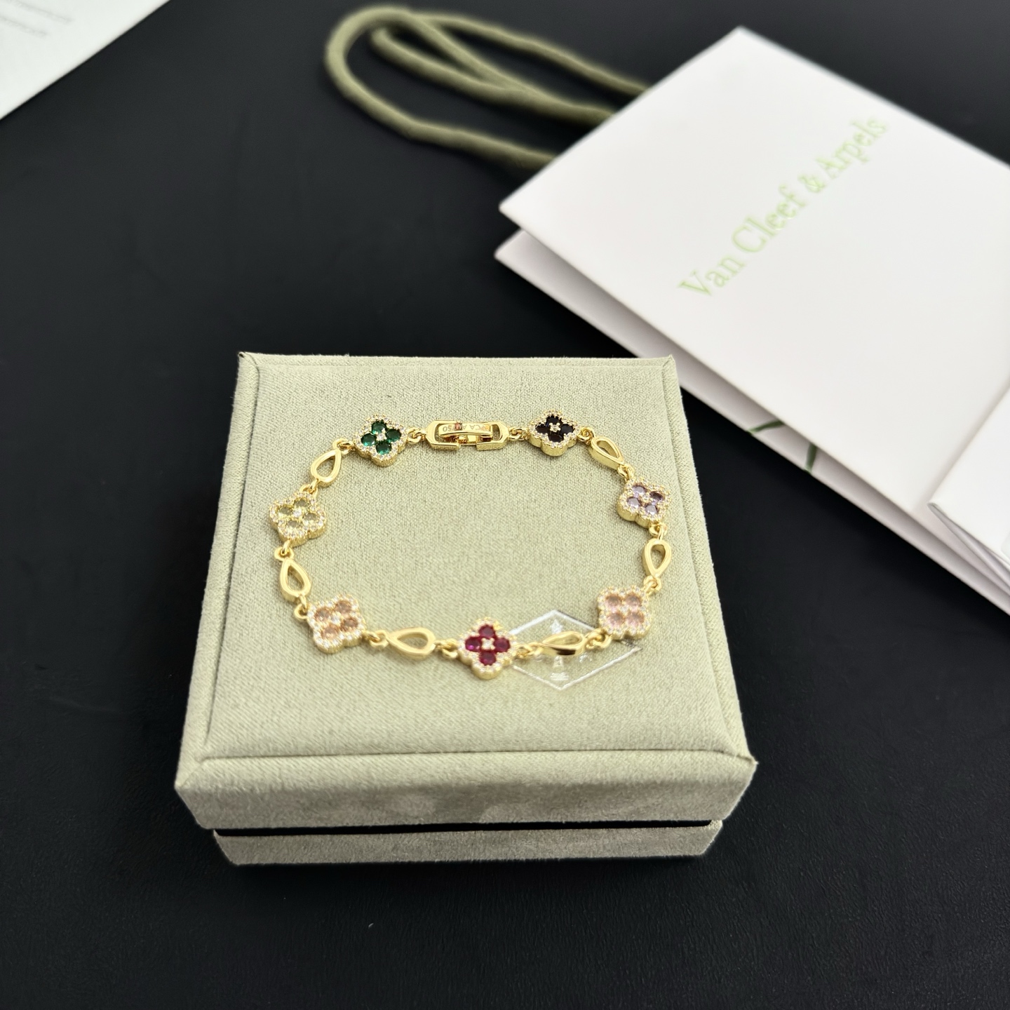Van Cleef Arpels Alhambra bracelet Yellow gold with multicolor gemstones peridot emerald onyx amethyst pink sapphire ruby diamond accents 18cm