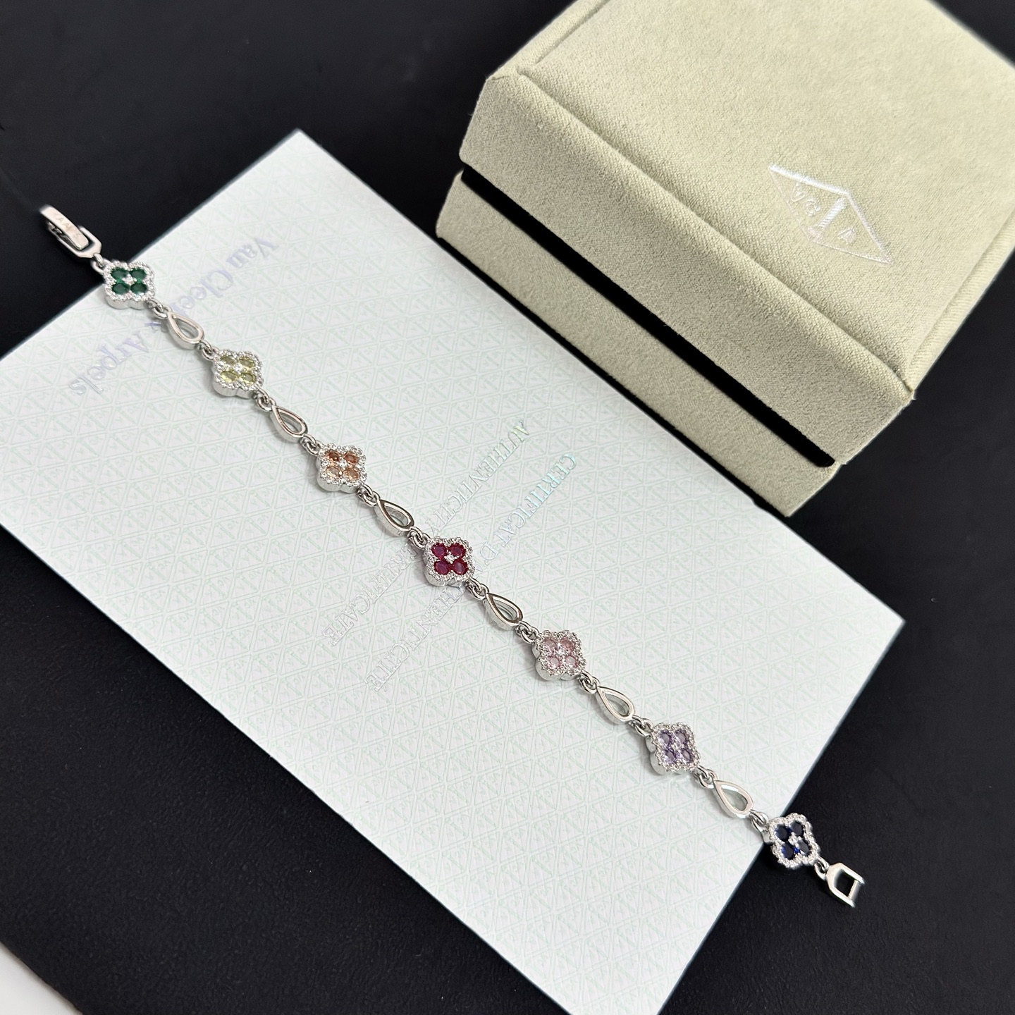 Van Cleef Arpels Alhambra bracelet Silver-toned metal with multicolor gemstones pink red champagne yellow purple dark blue green accented by white diamonds 17cm