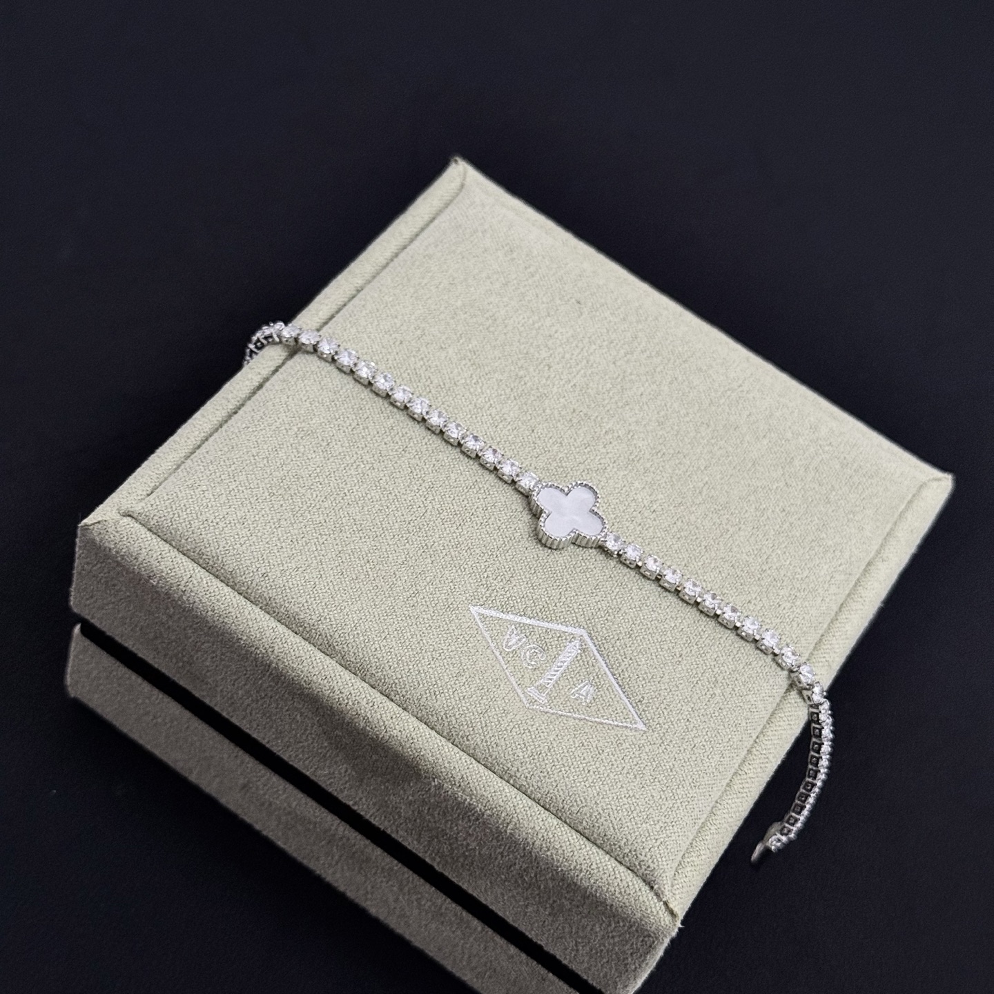 Van Cleef Arpels Alhambra bracelet Silver-toned metal white mother-of-pearl clear diamond simulants 17cm
