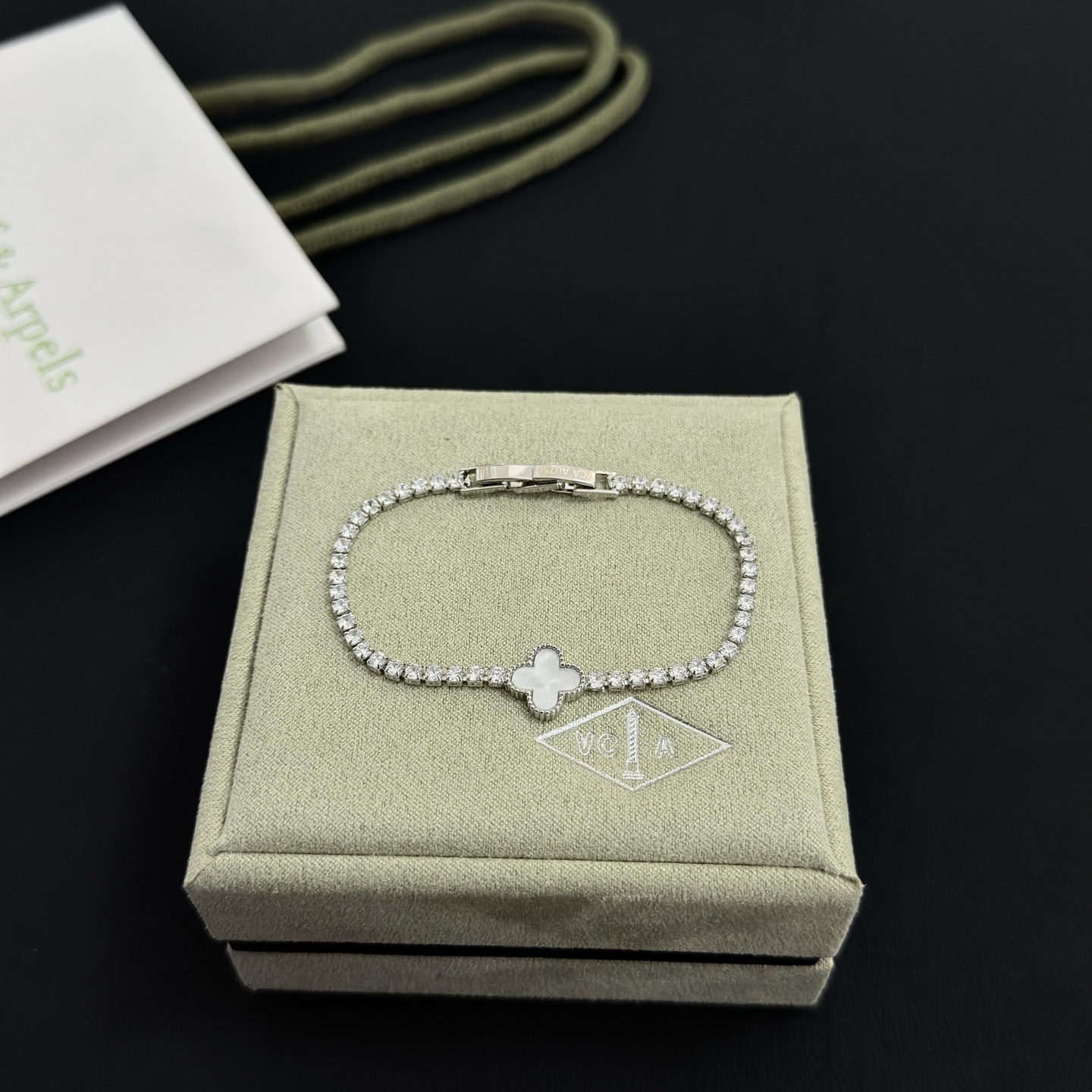 Van Cleef Arpels Alhambra bracelet Silver-toned metal white mother-of-pearl clear diamond simulants 17cm