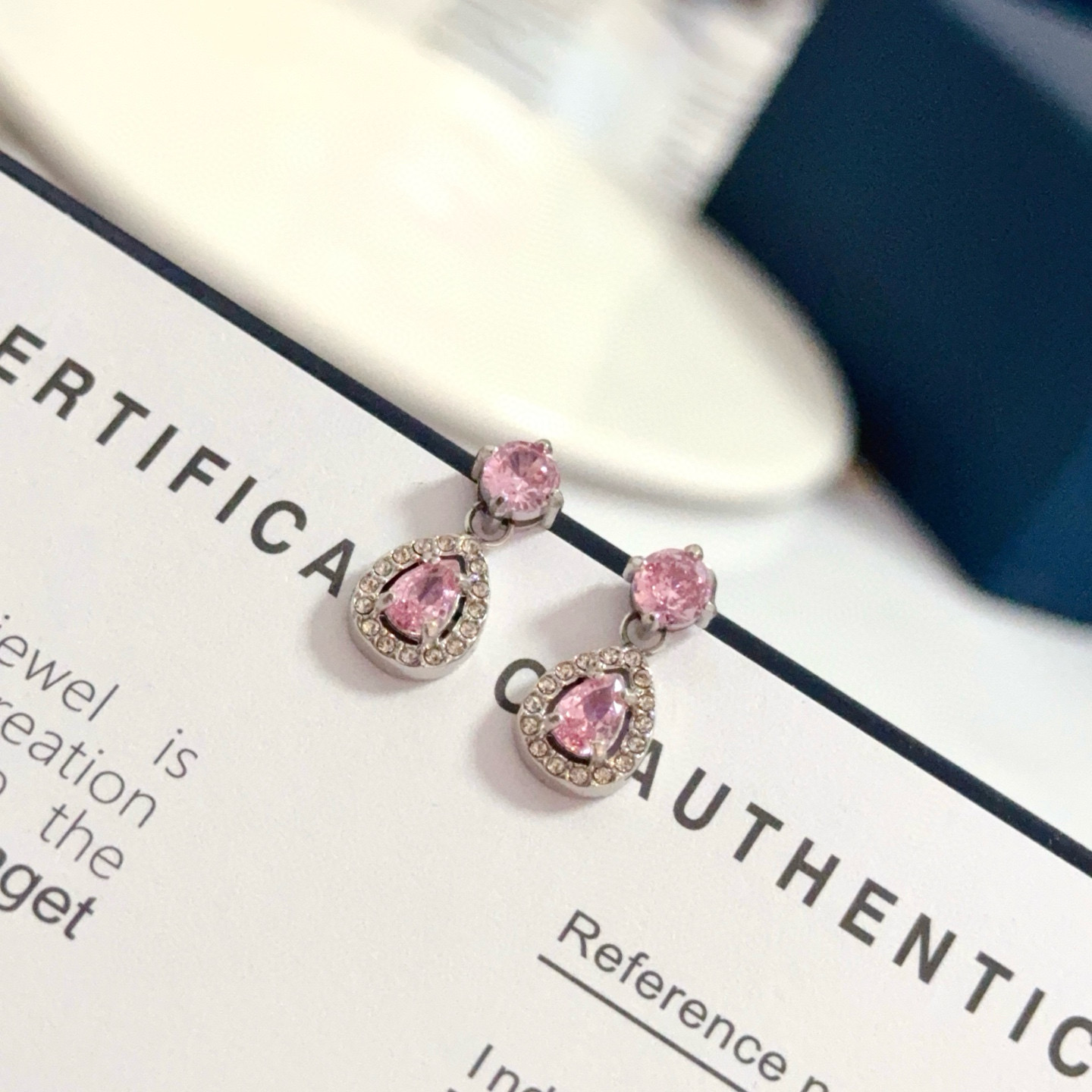 Piaget Rose Passion Teardrop Drop Earrings earrings silver-toned white gold metal with pink sapphire center stones and white diamond halo accents 1 2cm drop length