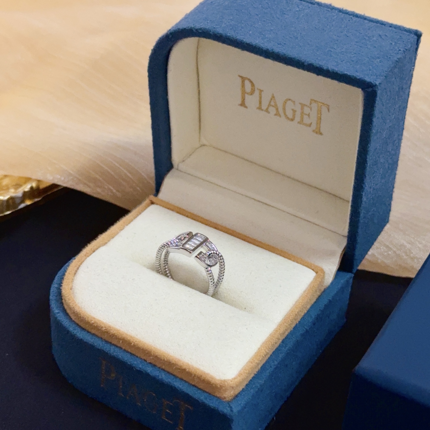 Piaget Possession ring silver-toned white gold with clear diamond accents adjustable open size