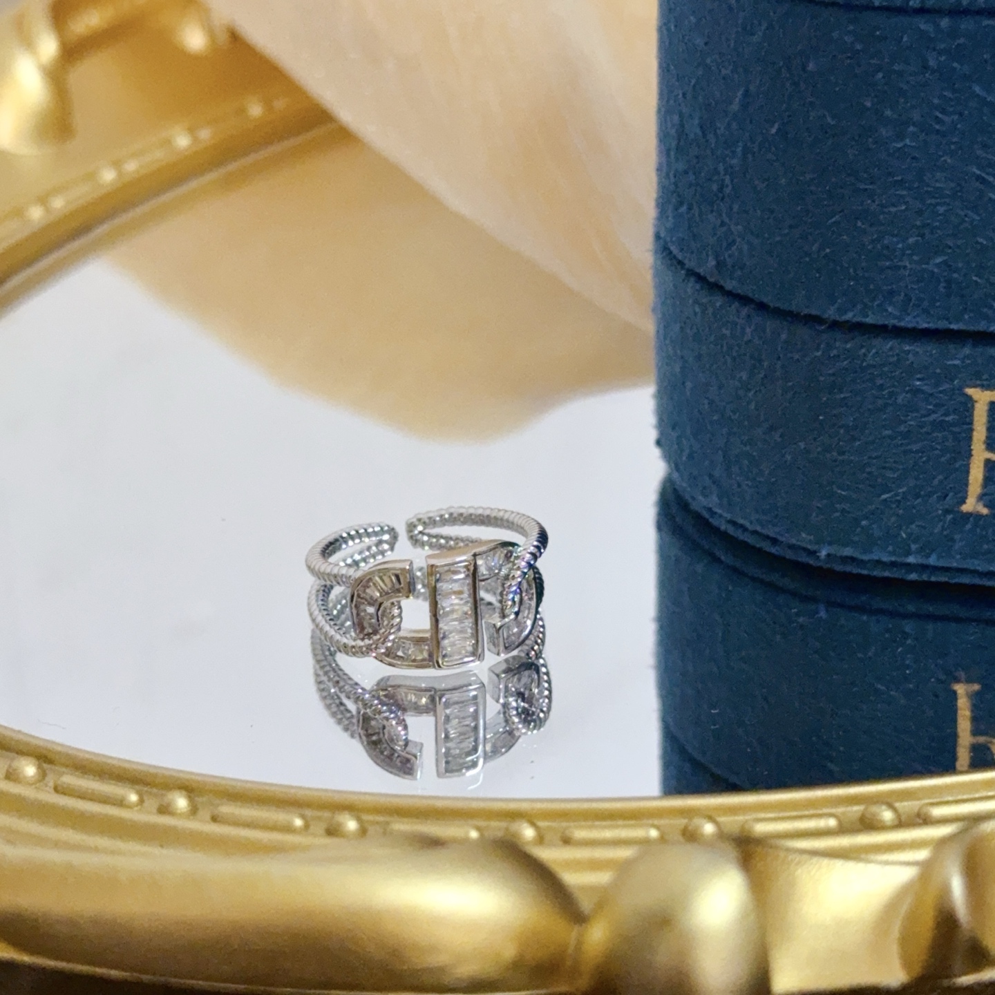 Piaget Possession ring silver-toned white gold with clear diamond accents adjustable open size