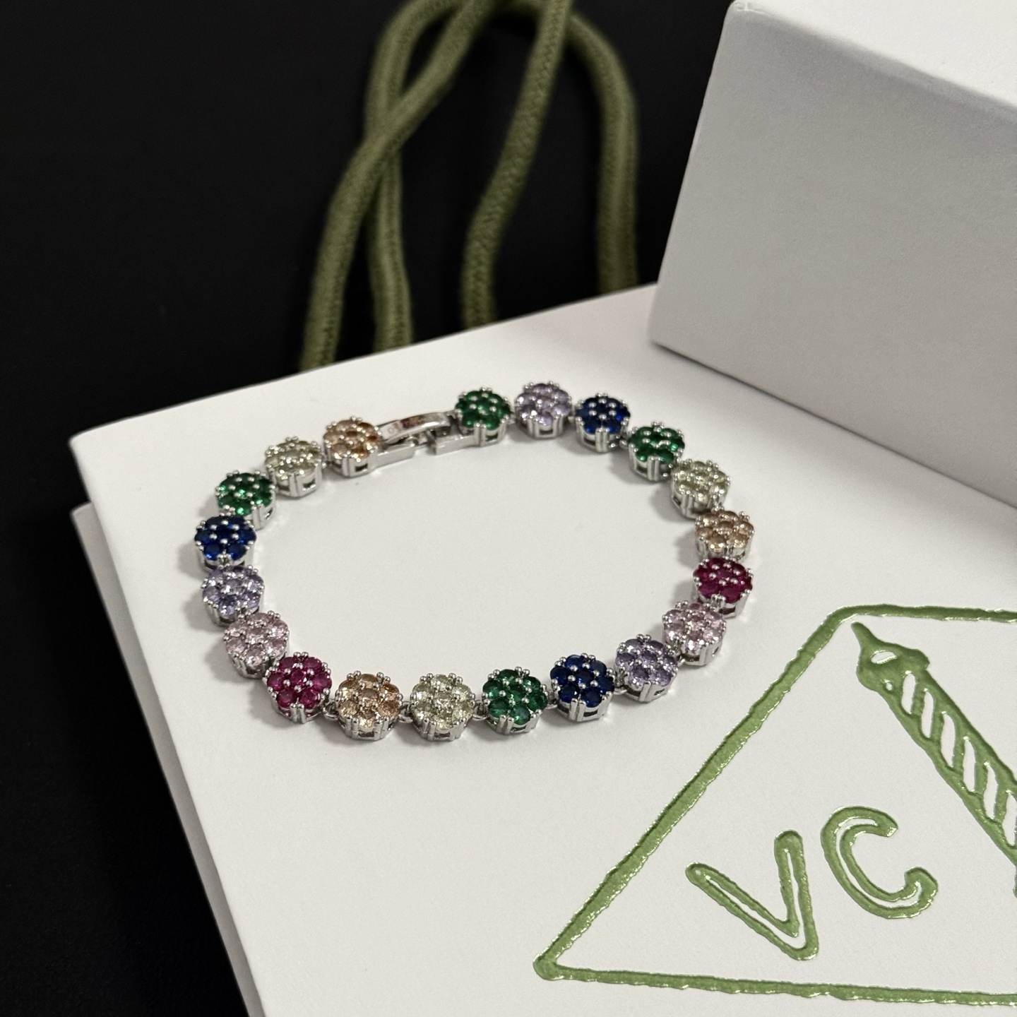 Van Cleef Arpels Fleurette bracelet silver-toned metal with multicolor gemstones green blue purple pink red champagne clear 17cm