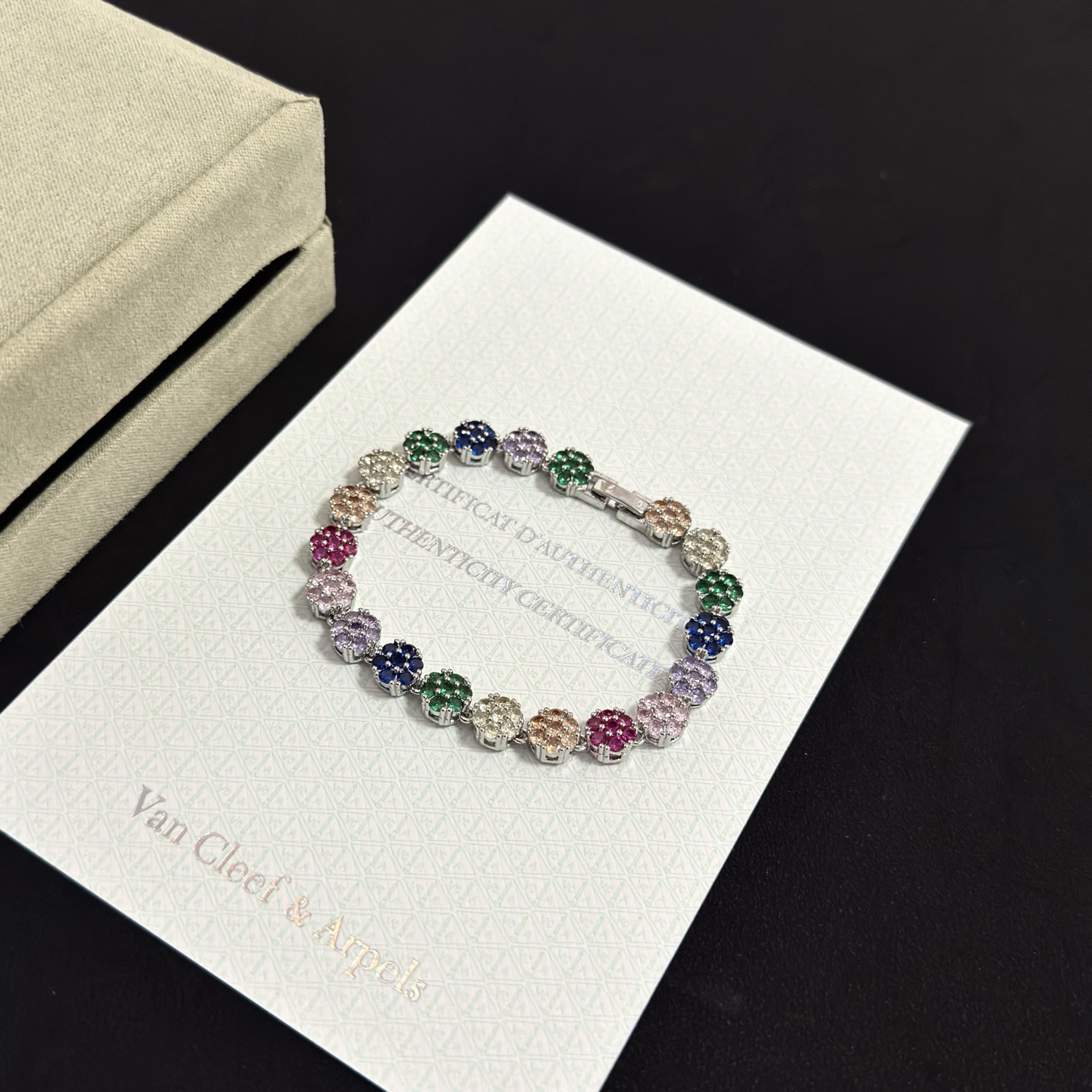 Van Cleef Arpels Fleurette bracelet silver-toned metal with multicolor gemstones green blue purple pink red champagne clear 17cm