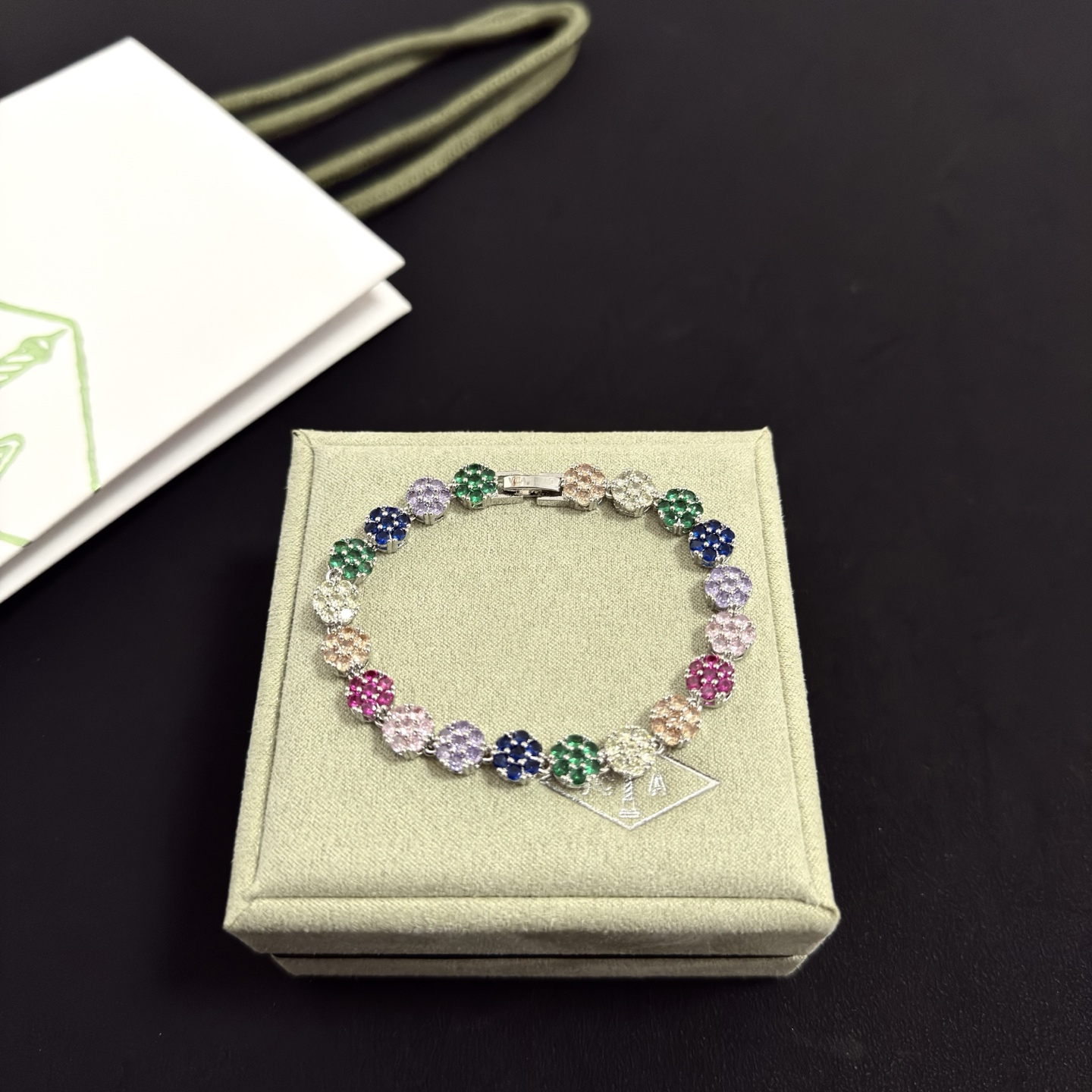 Van Cleef Arpels Fleurette bracelet silver-toned metal with multicolor gemstones green blue purple pink red champagne clear 17cm