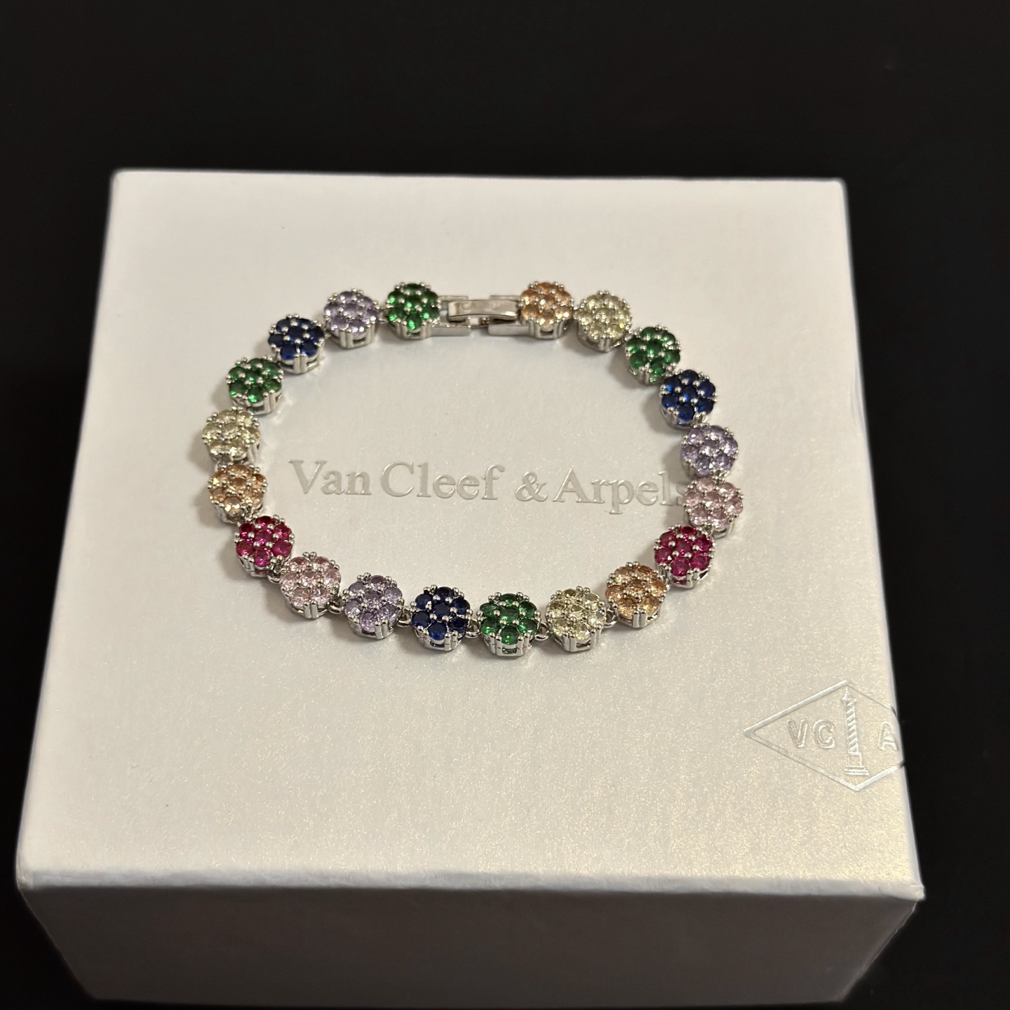 Van Cleef Arpels Fleurette bracelet silver-toned metal with multicolor gemstones green blue purple pink red champagne clear 17cm