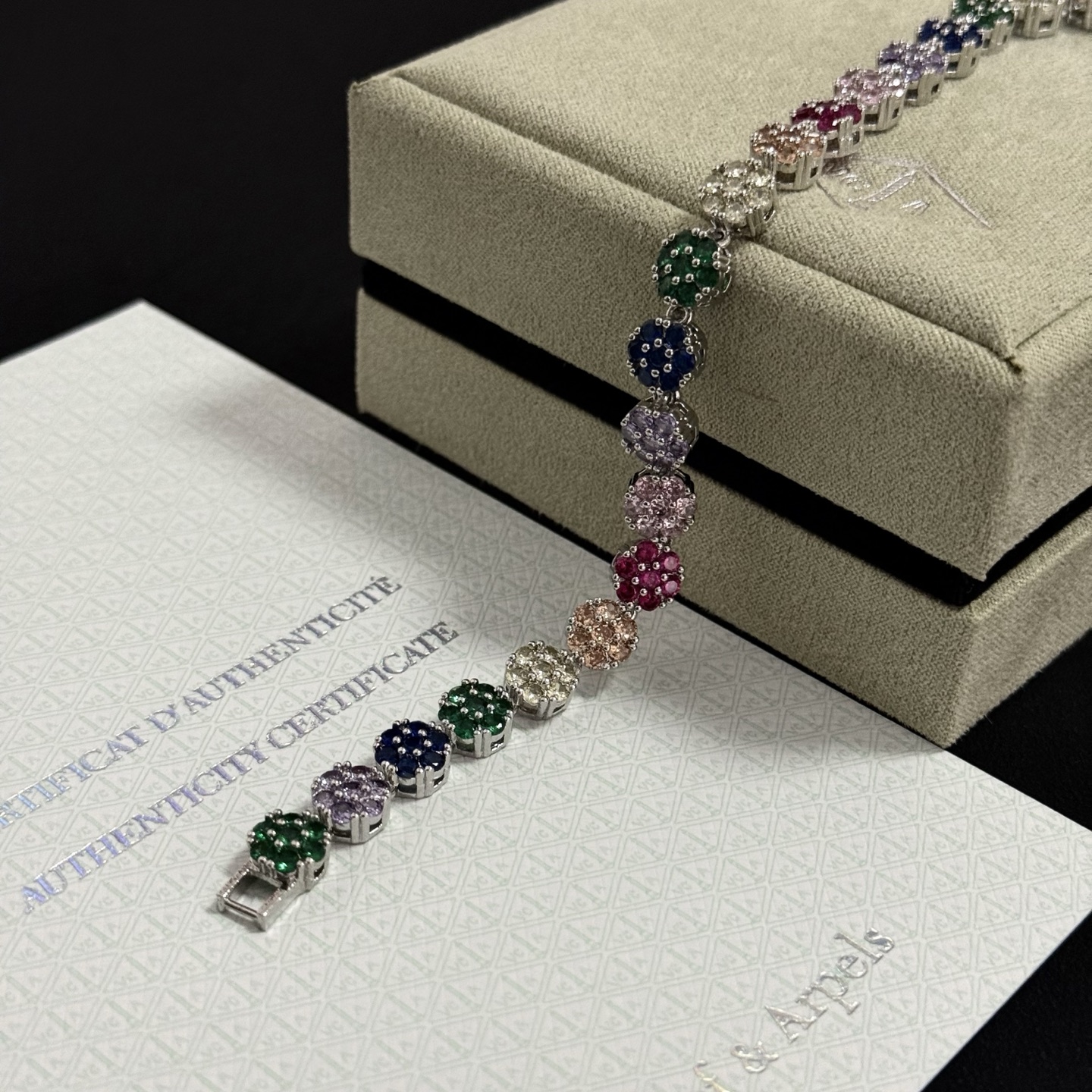 Van Cleef Arpels Fleurette bracelet silver-toned metal with multicolor gemstones green blue purple pink red champagne clear 17cm