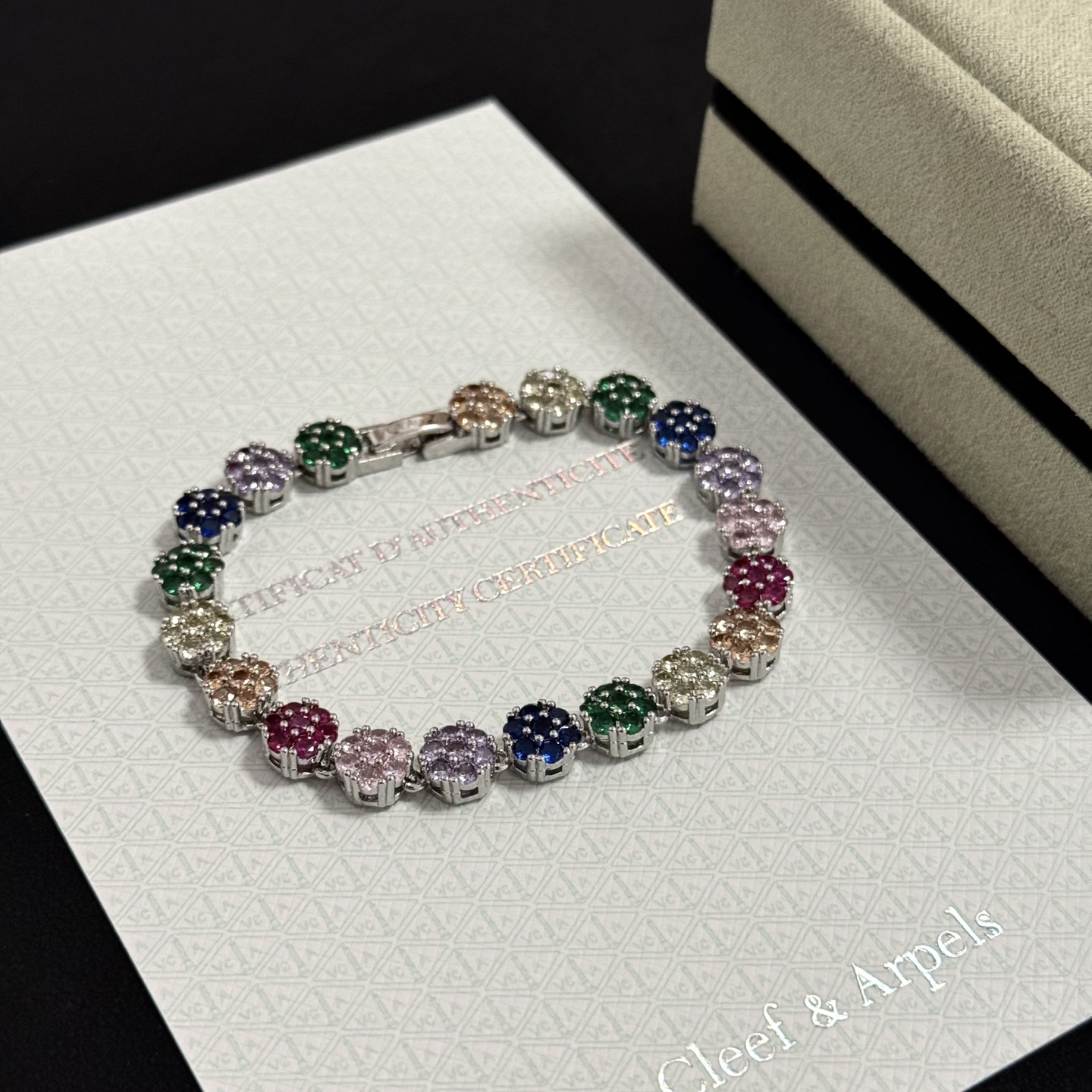 Van Cleef Arpels Fleurette bracelet silver-toned metal with multicolor gemstones green blue purple pink red champagne clear 17cm