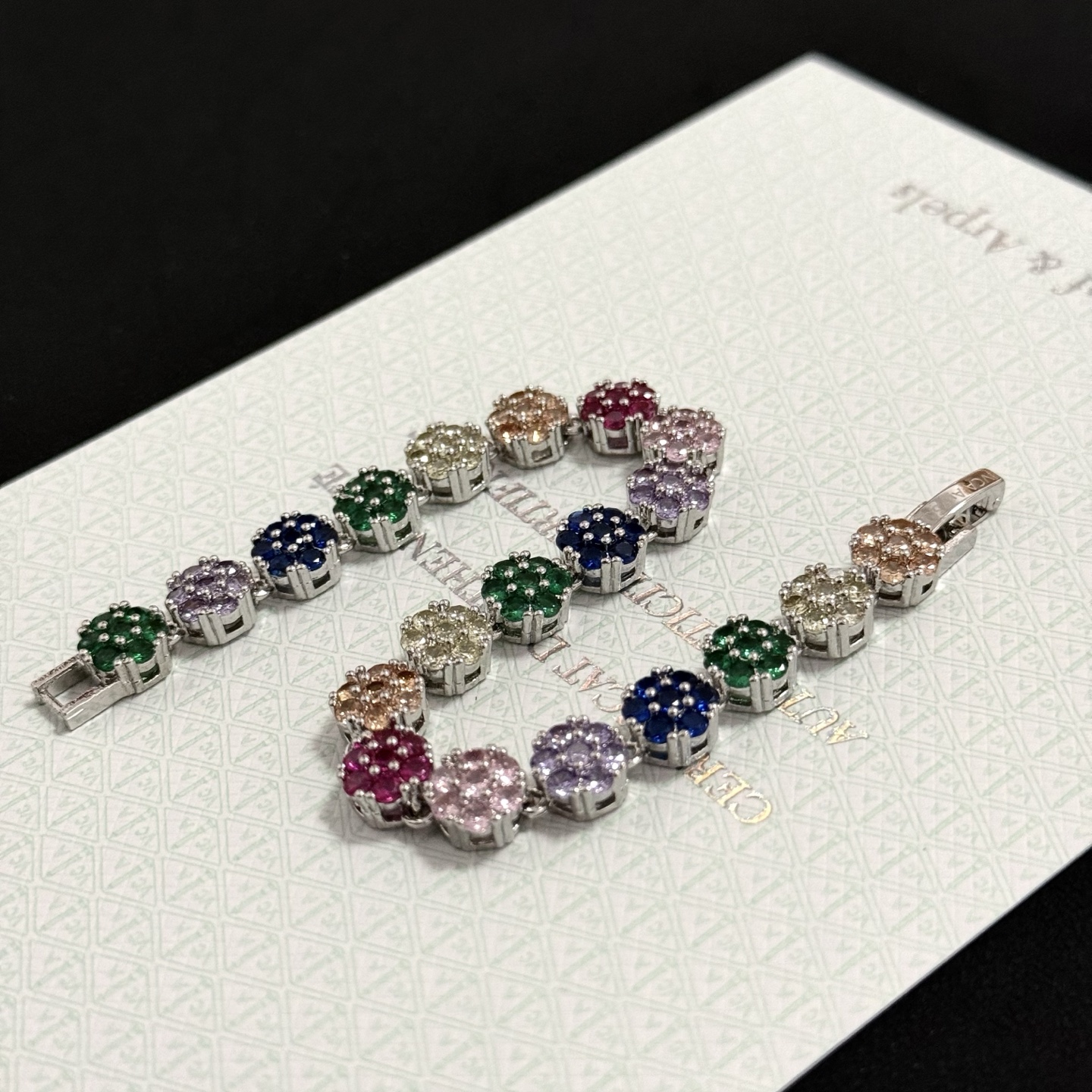 Van Cleef Arpels Fleurette bracelet silver-toned metal with multicolor gemstones green blue purple pink red champagne clear 17cm