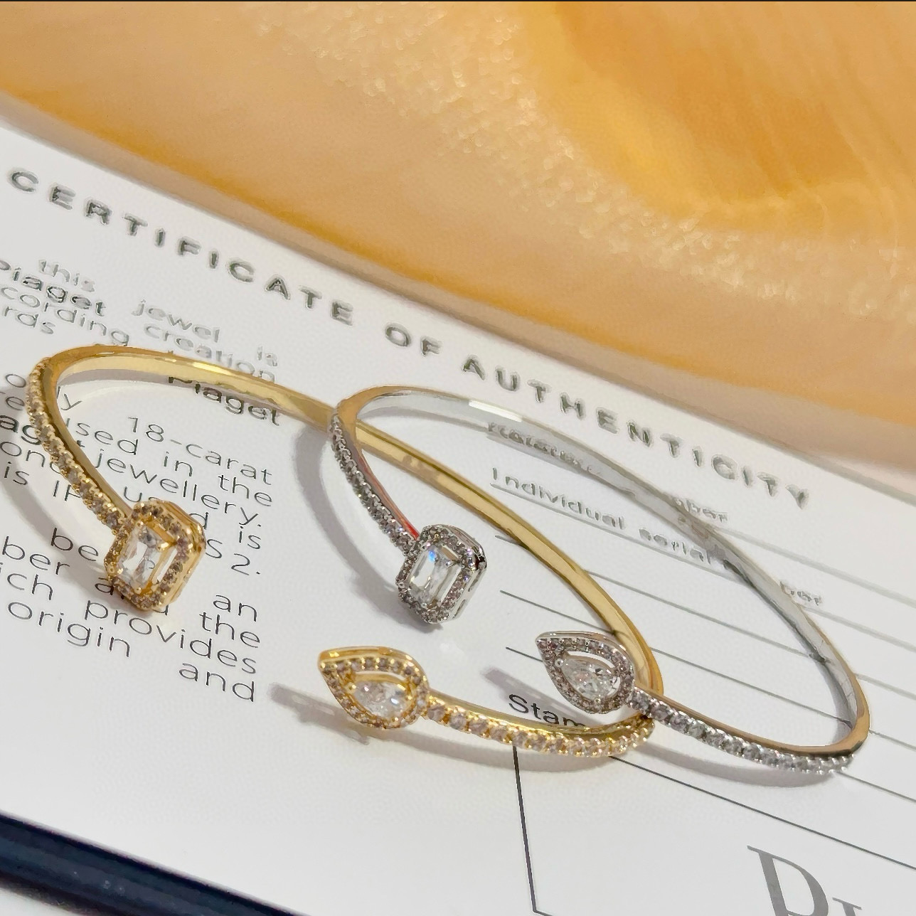 Piaget Treasures Open Cuff Bangle bracelet 18k yellow gold with clear diamond accent stones 17cm inner circumference