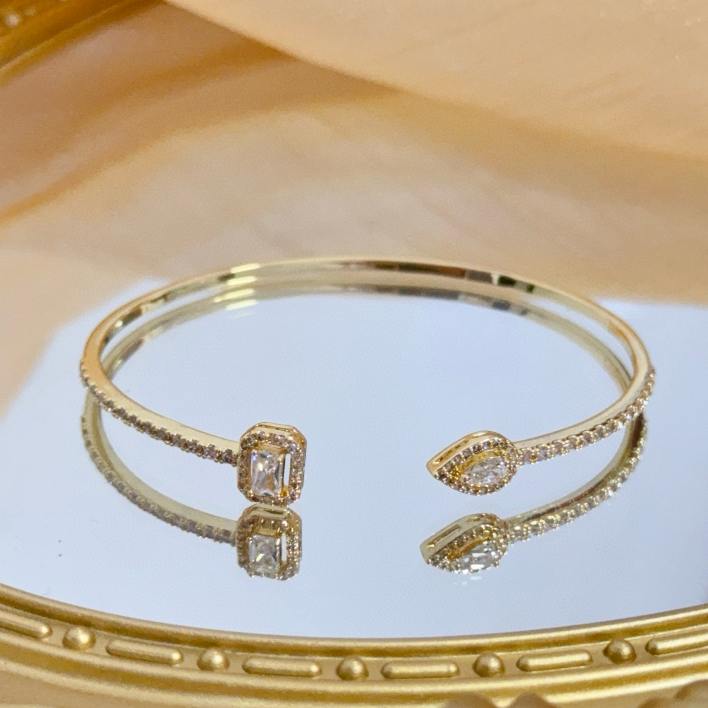 Piaget Treasures Open Cuff Bangle bracelet 18k yellow gold with clear diamond accent stones 17cm inner circumference