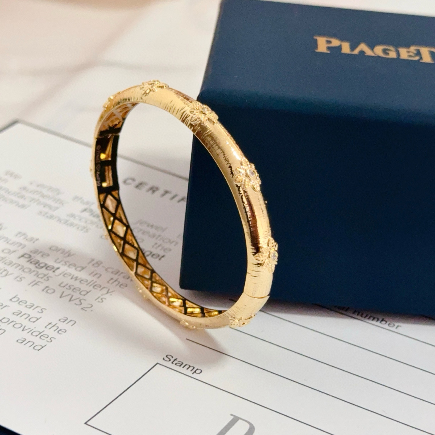 Piaget Rose Bangle bracelet 18k yellow gold with clear diamond accents 17cm inner circumference