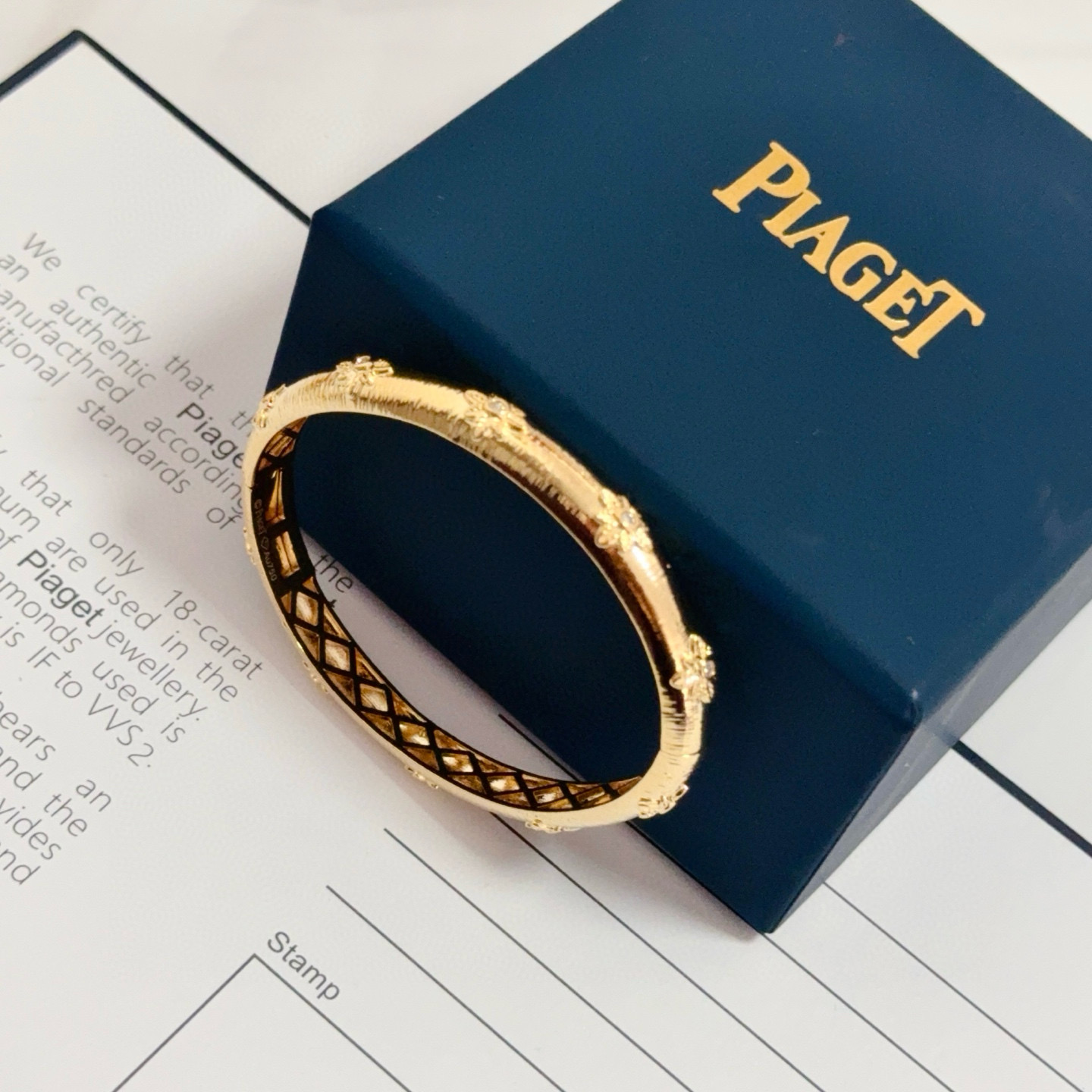 Piaget Rose Bangle bracelet 18k yellow gold with clear diamond accents 17cm inner circumference