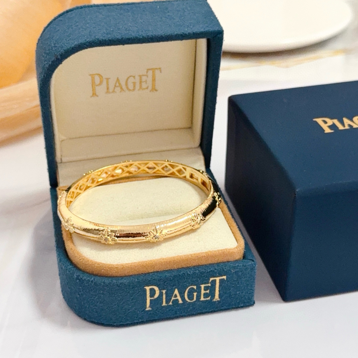 Piaget Rose Bangle bracelet 18k yellow gold with clear diamond accents 17cm inner circumference