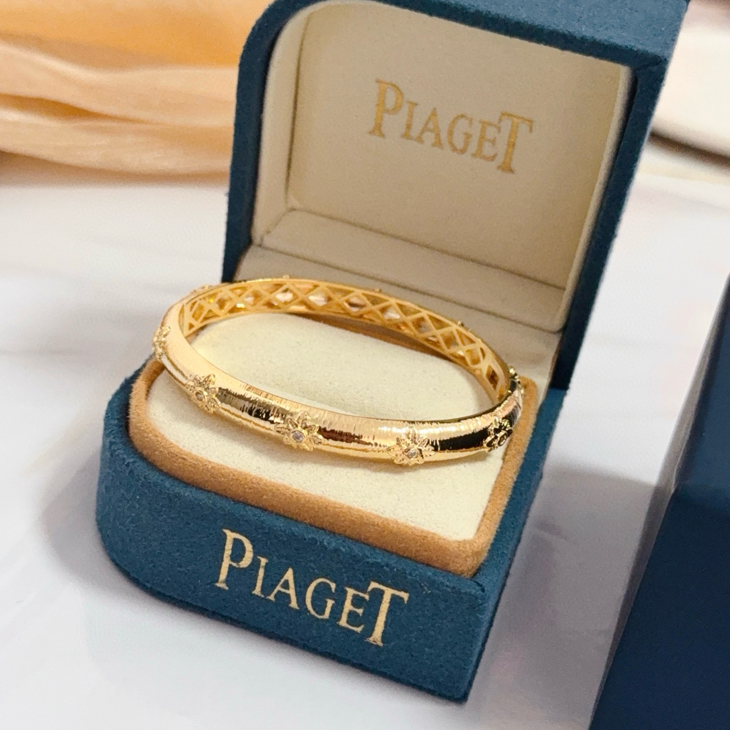 Piaget Rose Bangle bracelet 18k yellow gold with clear diamond accents 17cm inner circumference