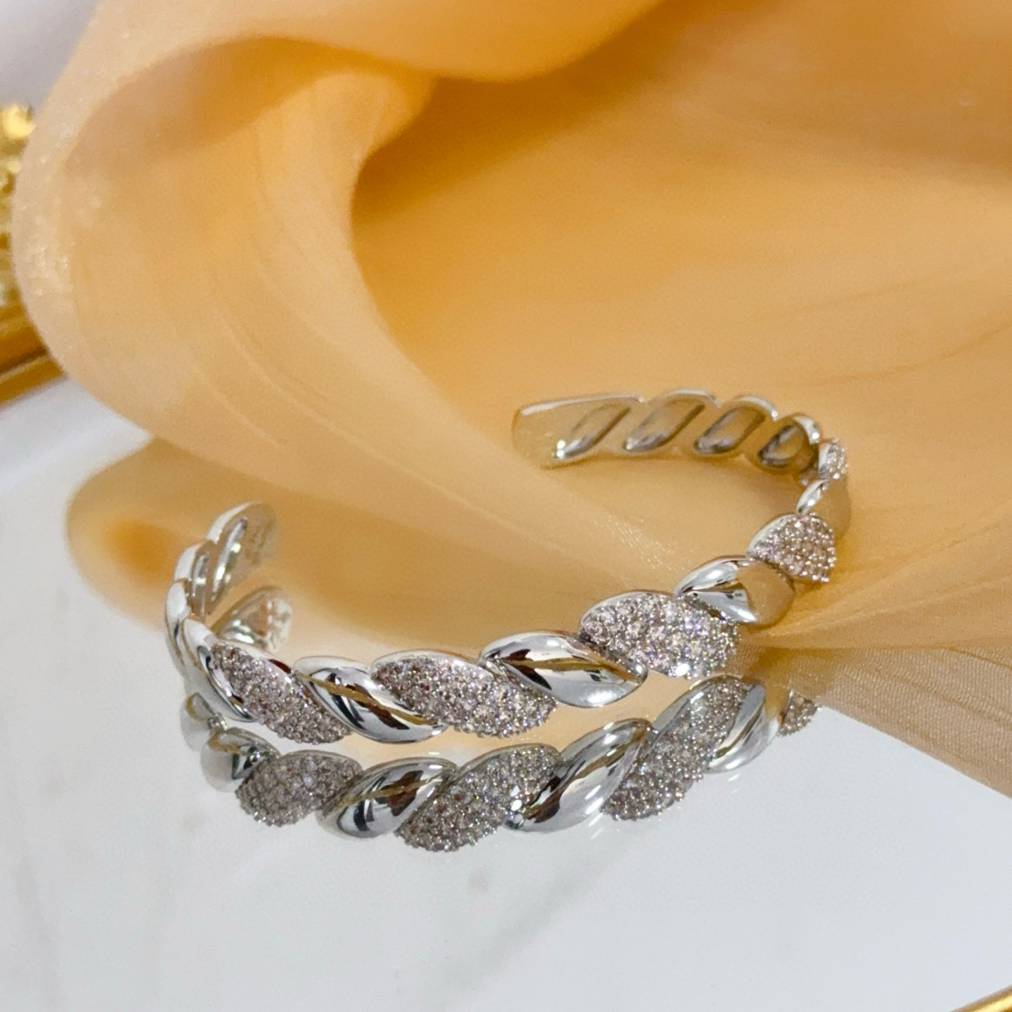 Piaget Twist Cuff bracelet silver-toned white gold with clear pave diamonds 17cm inner circumference