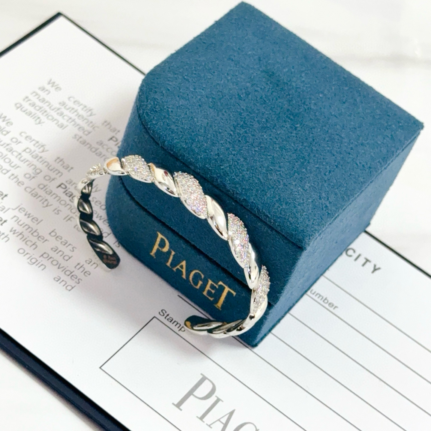 Piaget Twist Cuff bracelet silver-toned white gold with clear pave diamonds 17cm inner circumference