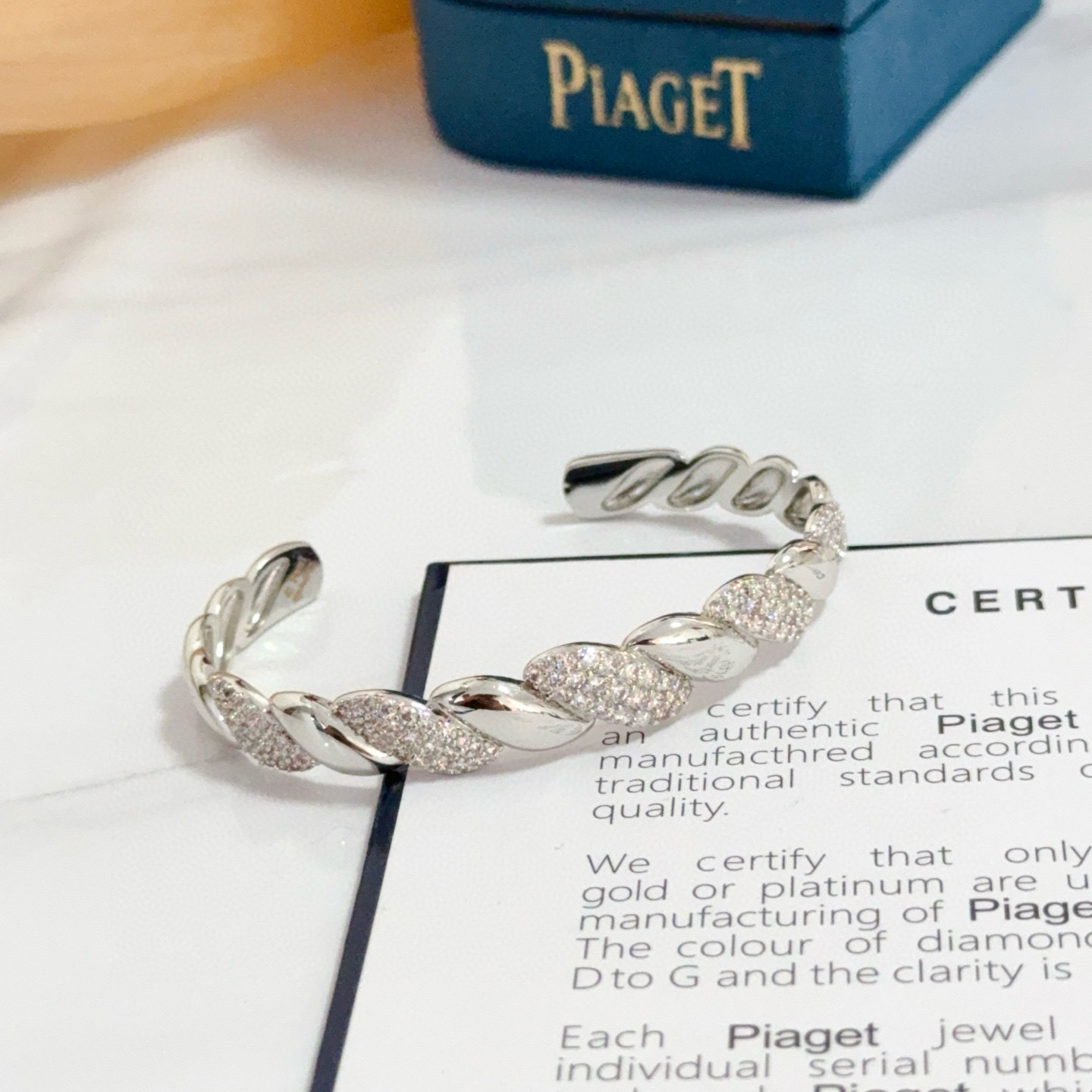 Piaget Twist Cuff bracelet silver-toned white gold with clear pave diamonds 17cm inner circumference