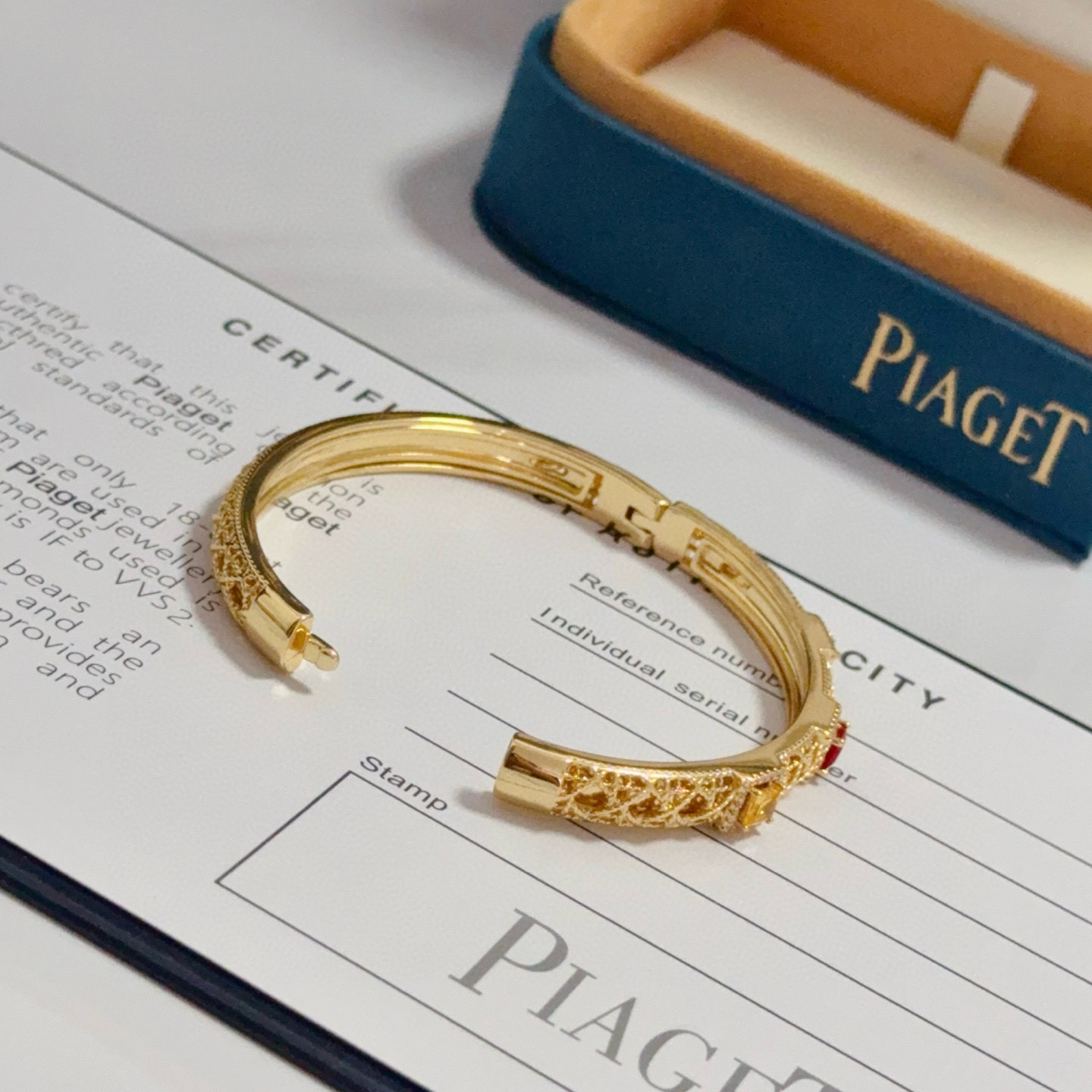 Piaget Sunlight Journey bracelet 18k yellow gold with red yellow green gemstones and diamond accents 17cm inner circumference