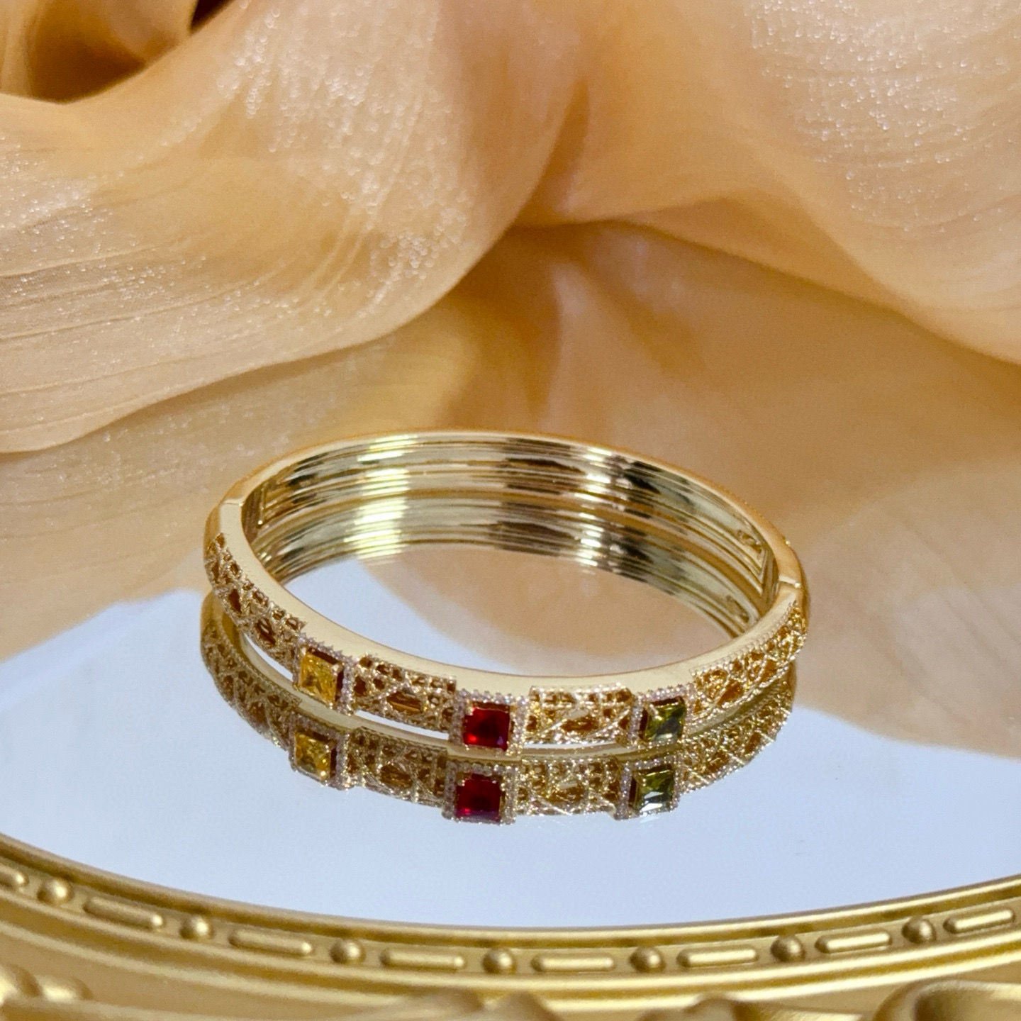 Piaget Sunlight Journey bracelet 18k yellow gold with red yellow green gemstones and diamond accents 17cm inner circumference