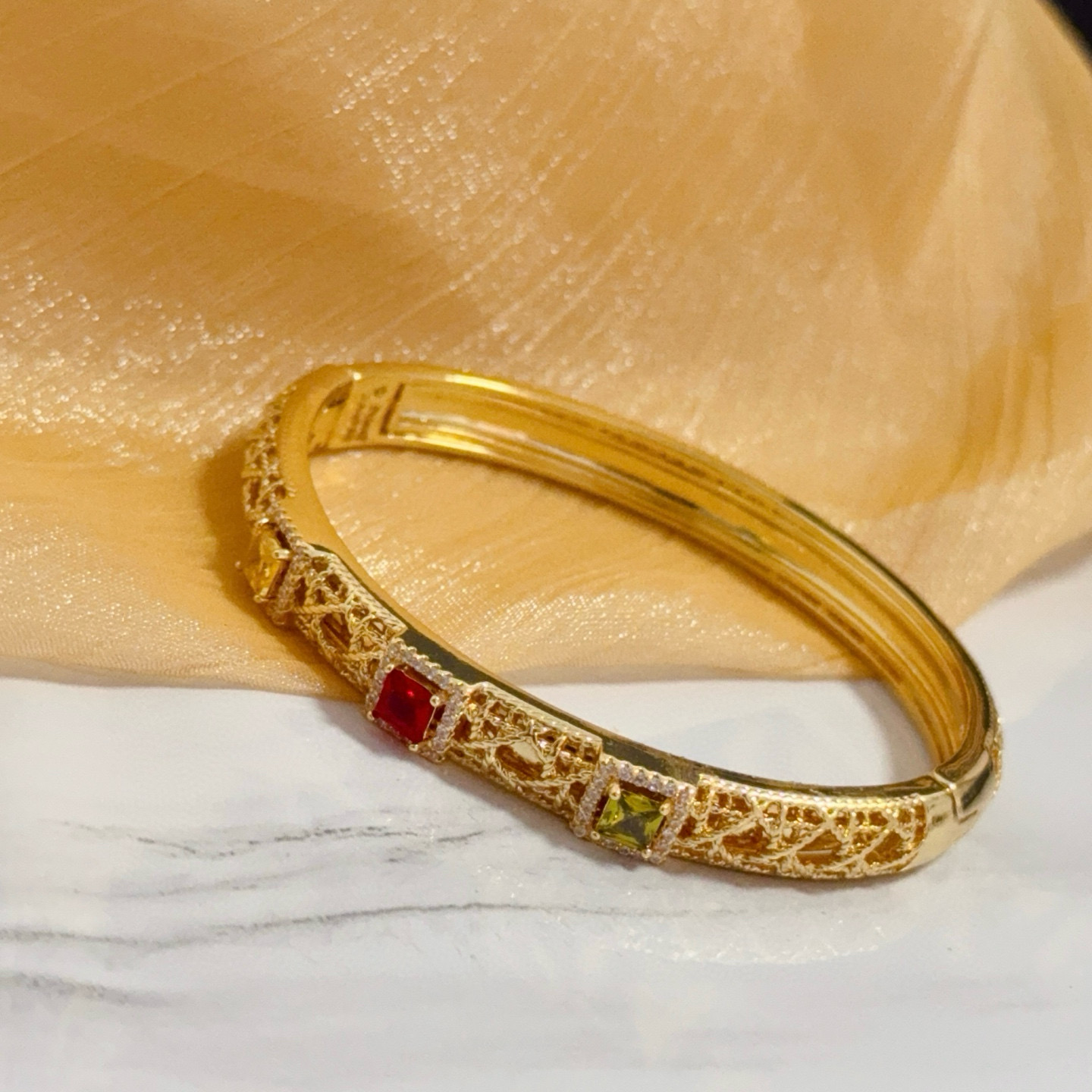 Piaget Sunlight Journey bracelet 18k yellow gold with red yellow green gemstones and diamond accents 17cm inner circumference