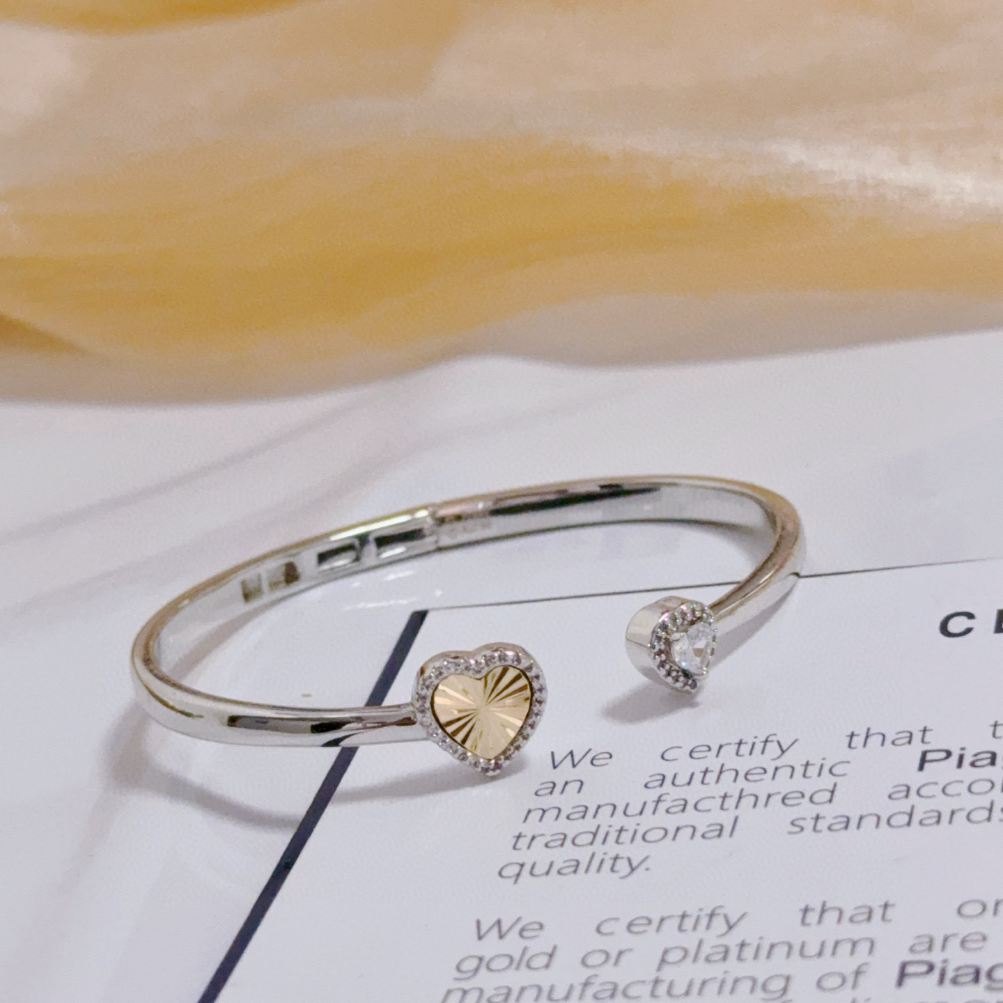 Piaget Heart Open Cuff Bangle bracelet Silver-toned white gold metal yellow gold heart accent clear diamond accents 16cm inner circumference