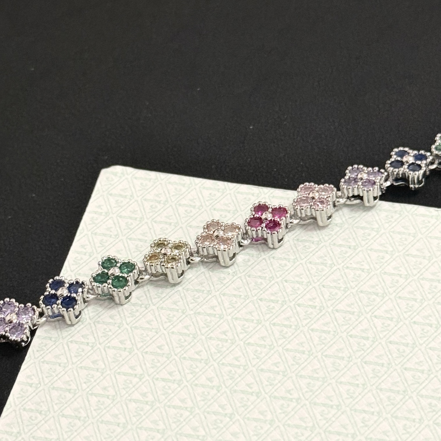 Van Cleef Arpels Alhambra bracelet Silver-toned metal with multicolor gemstones fuchsia pink light pink champagne pale yellow green navy blue lavender purple 18cm