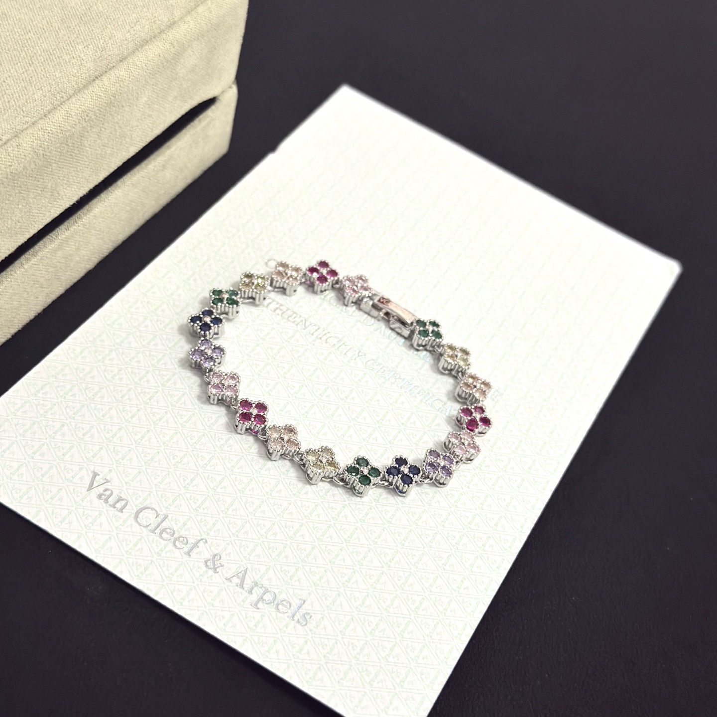 Van Cleef Arpels Alhambra bracelet Silver-toned metal with multicolor gemstones fuchsia pink light pink champagne pale yellow green navy blue lavender purple 18cm