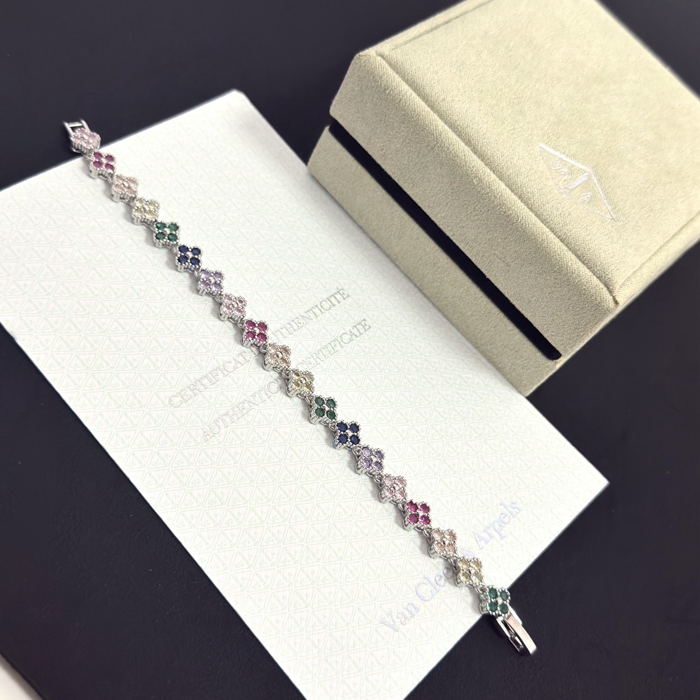 Van Cleef Arpels Alhambra bracelet Silver-toned metal with multicolor gemstones fuchsia pink light pink champagne pale yellow green navy blue lavender purple 18cm