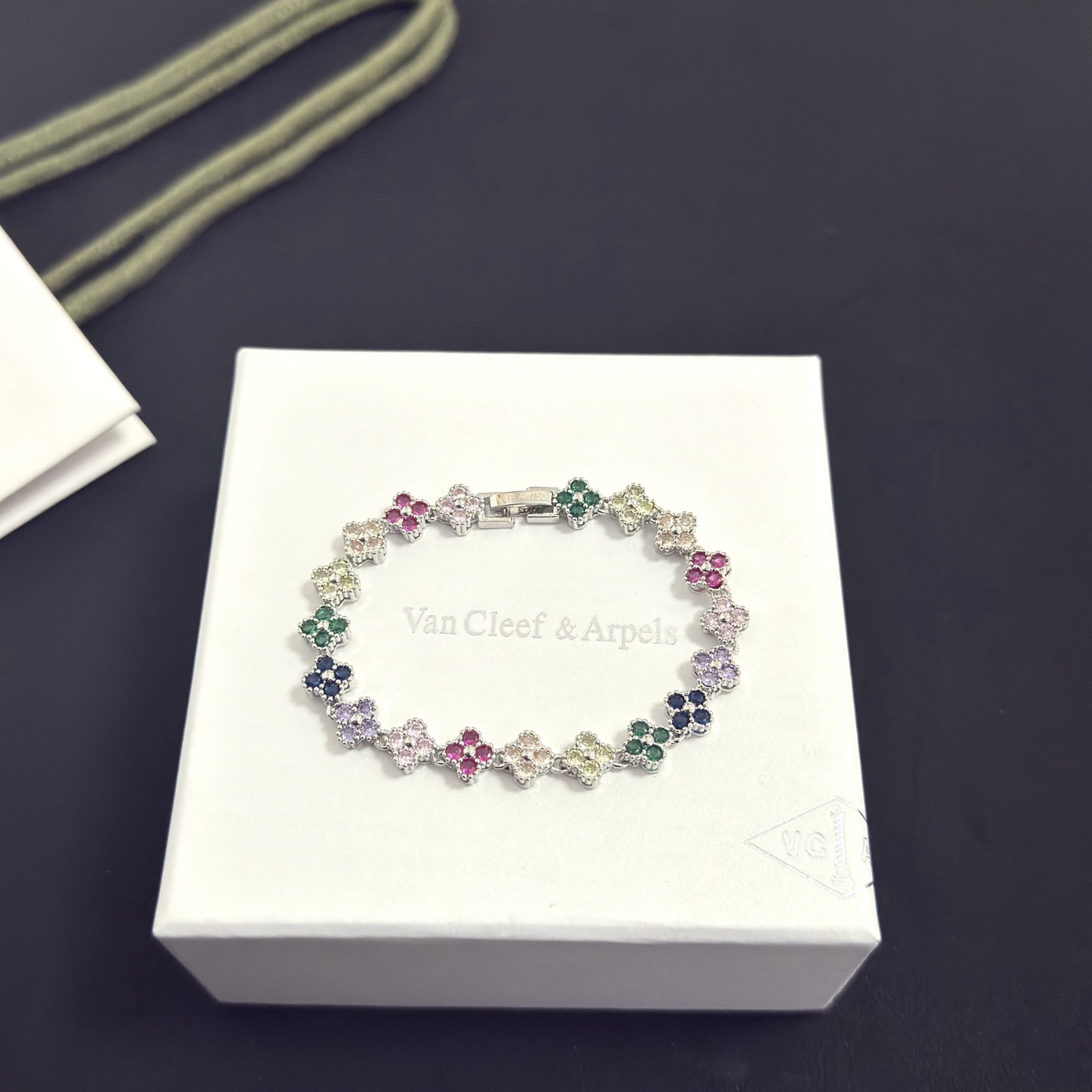 Van Cleef Arpels Alhambra bracelet Silver-toned metal with multicolor gemstones fuchsia pink light pink champagne pale yellow green navy blue lavender purple 18cm