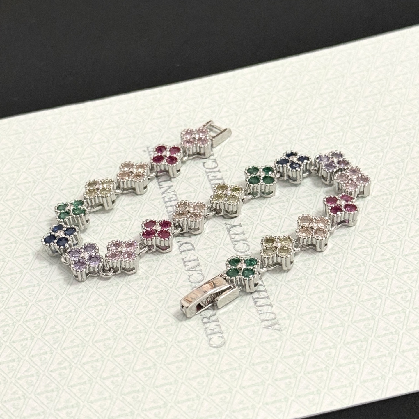 Van Cleef Arpels Alhambra bracelet Silver-toned metal with multicolor gemstones fuchsia pink light pink champagne pale yellow green navy blue lavender purple 18cm