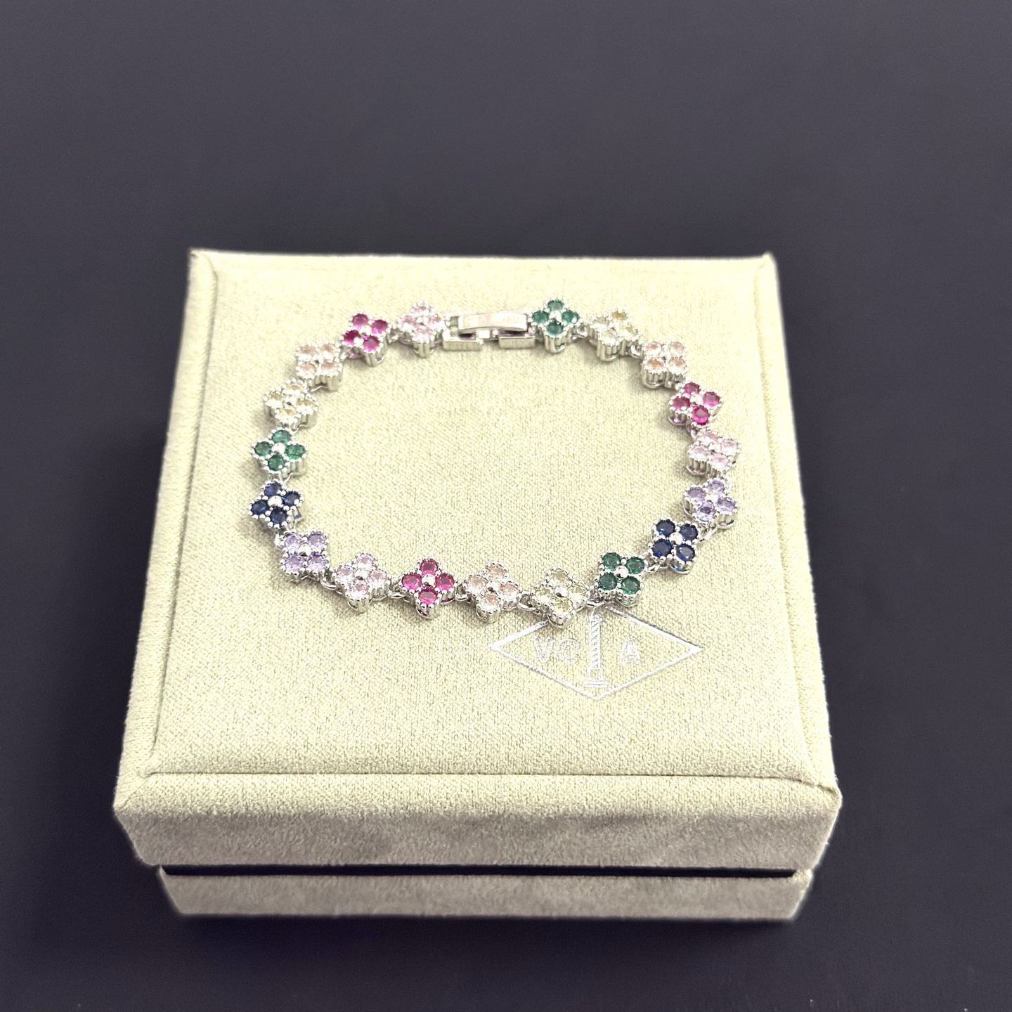 Van Cleef Arpels Alhambra bracelet Silver-toned metal with multicolor gemstones fuchsia pink light pink champagne pale yellow green navy blue lavender purple 18cm