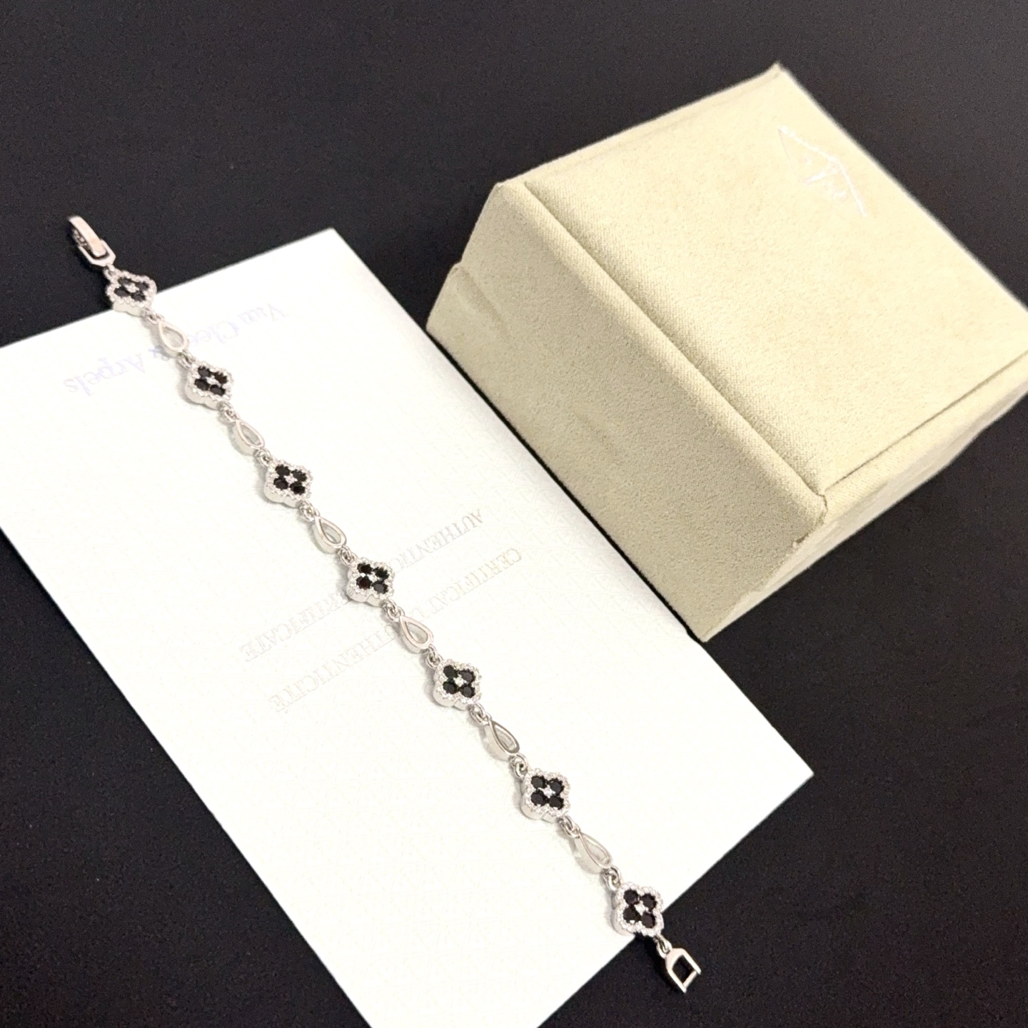 Van Cleef Arpels Alhambra bracelet silver-toned metal with black onyx and clear diamond accents 18cm