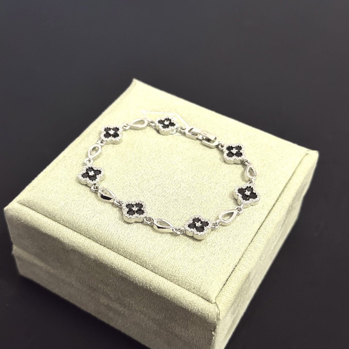 Van Cleef Arpels Alhambra bracelet silver-toned metal with black onyx and clear diamond accents 18cm
