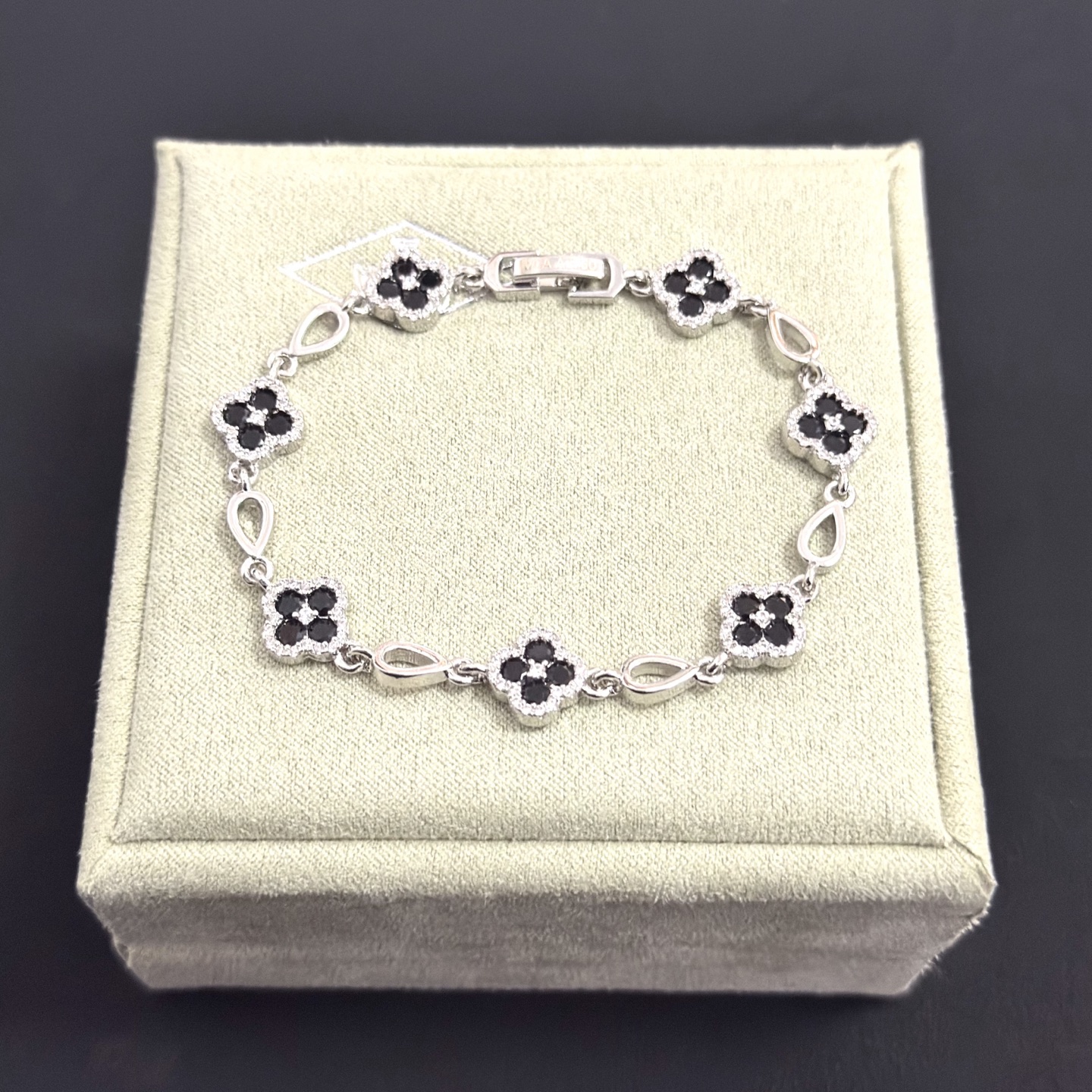 Van Cleef Arpels Alhambra bracelet silver-toned metal with black onyx and clear diamond accents 18cm