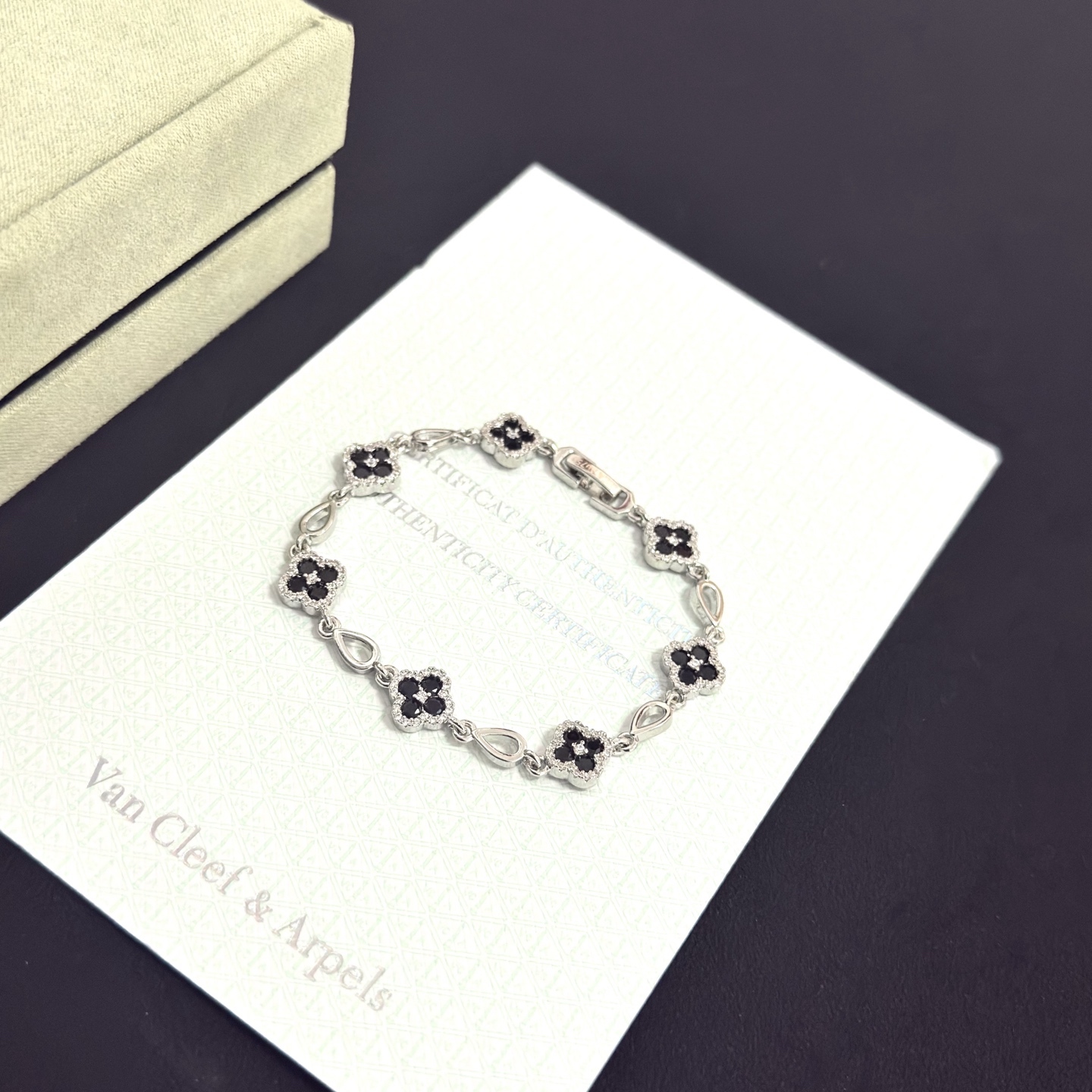 Van Cleef Arpels Alhambra bracelet silver-toned metal with black onyx and clear diamond accents 18cm