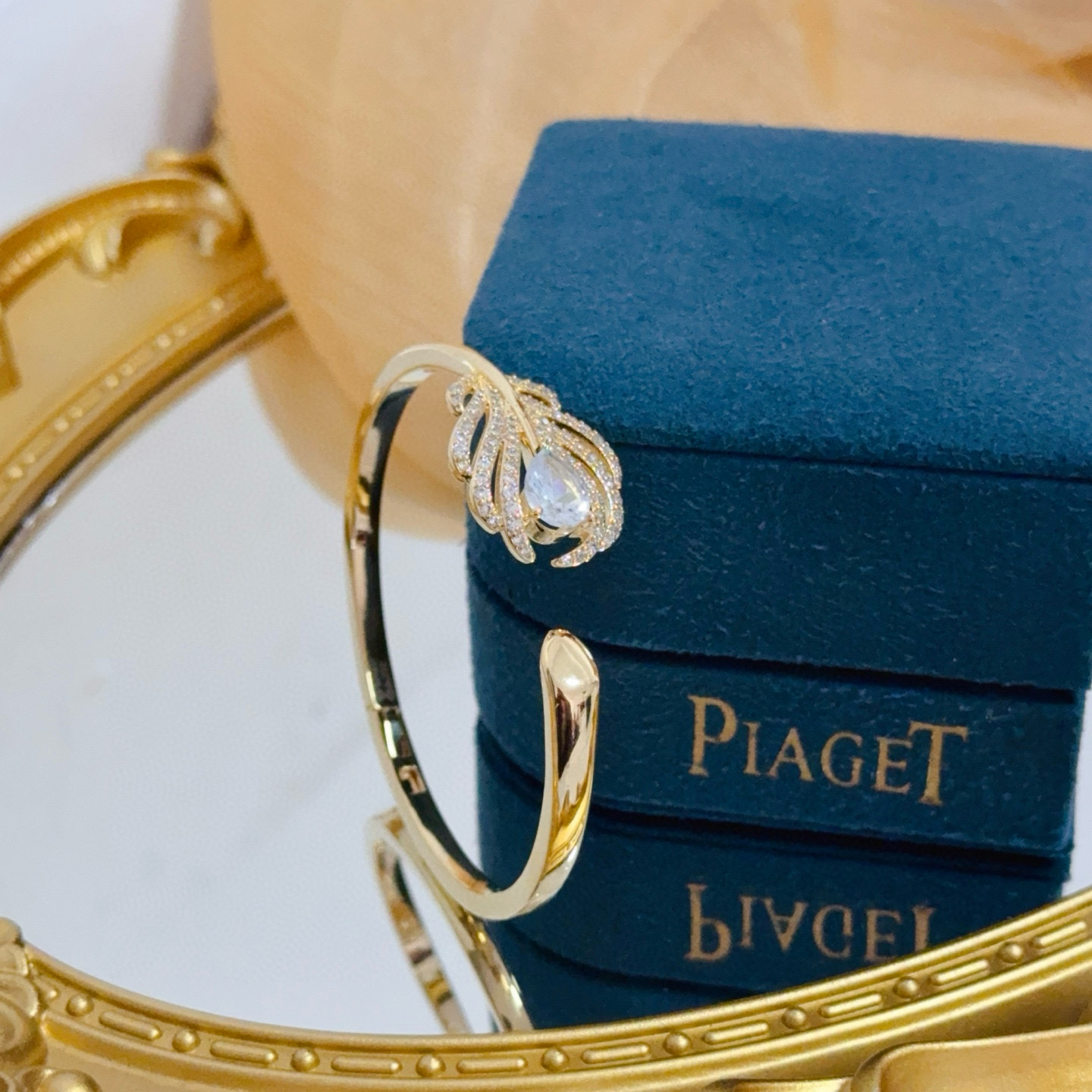 Piaget Feather Motif Open Cuff bracelet Yellow gold metal with clear faceted gemstones and pave-set clear accent stones 17cm inner circumference