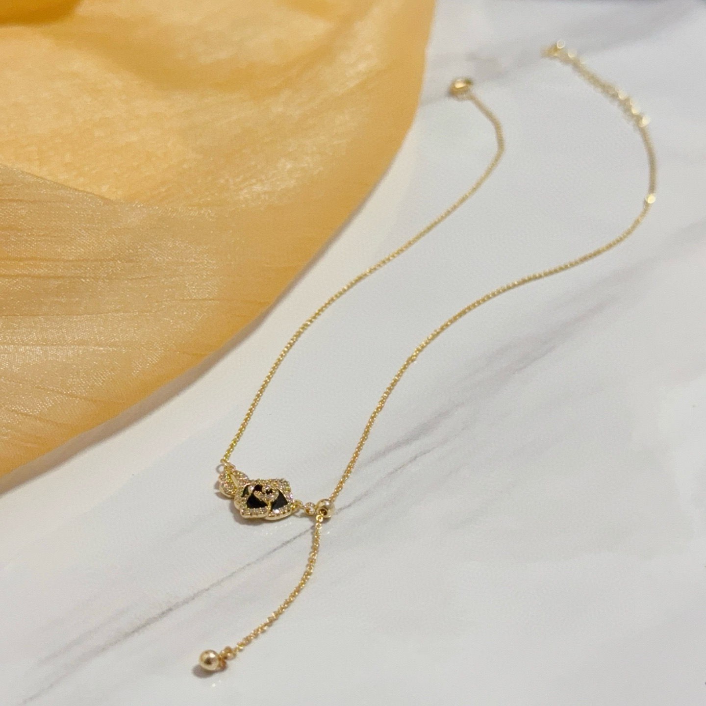 Piaget Rose necklace yellow gold with black enamel and clear diamond accents 45cm